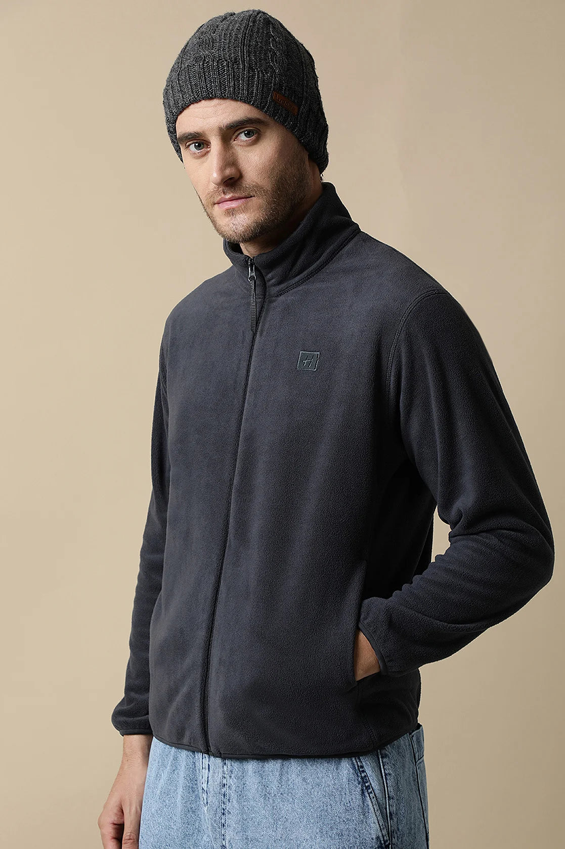 Upgrade your wardrobe with the Fort Collins Men's Dark Grey Full-Zip Fleece Jacket, now available for online purchase from anywhere in India. Explore our trendy collection and elevate your style.