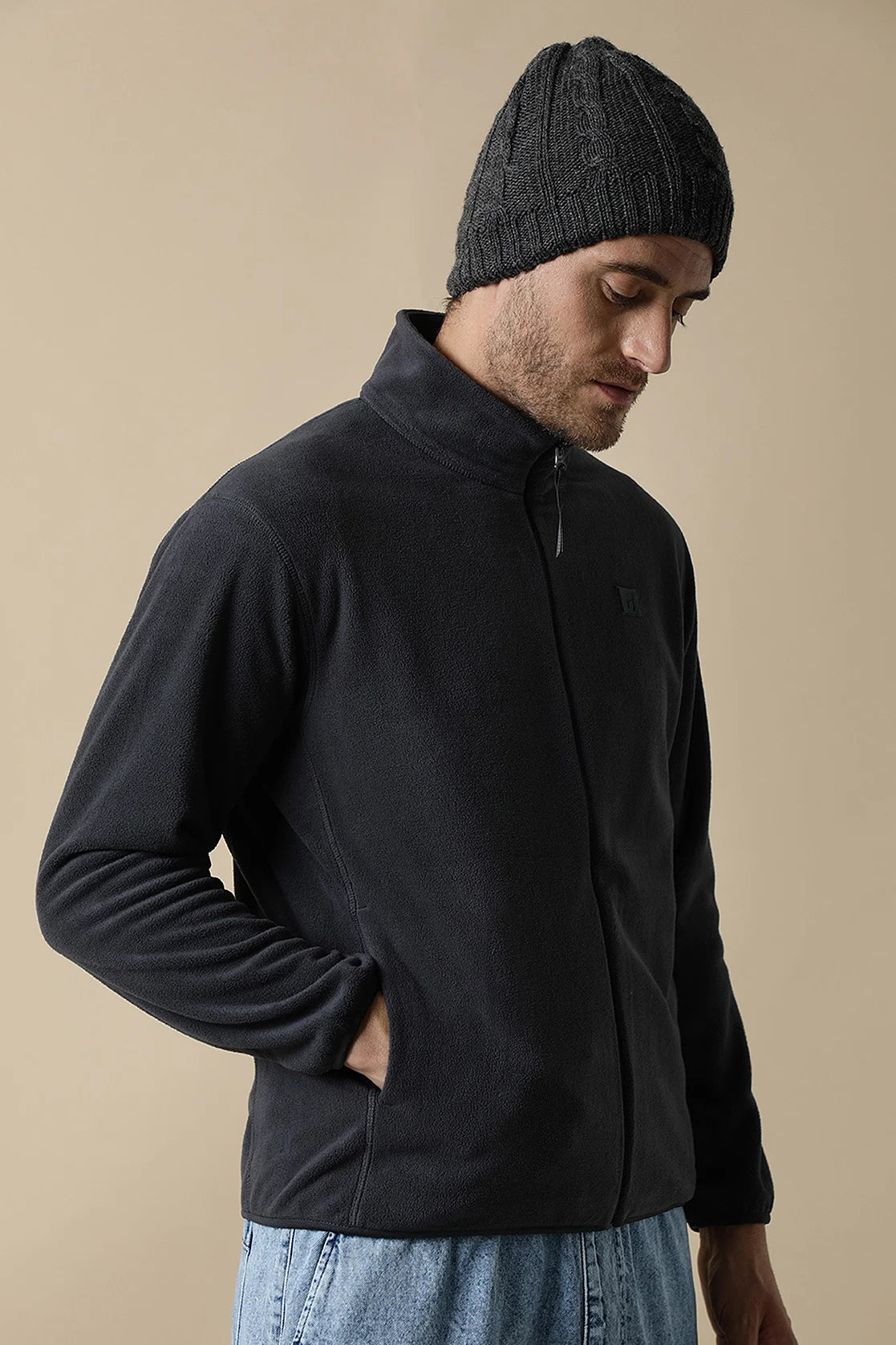 Discover the stylish Fort Collins Men's Dark Grey Full-Zip Fleece Jacket, available for online purchase throughout India. Elevate your wardrobe with this fashionable piece.