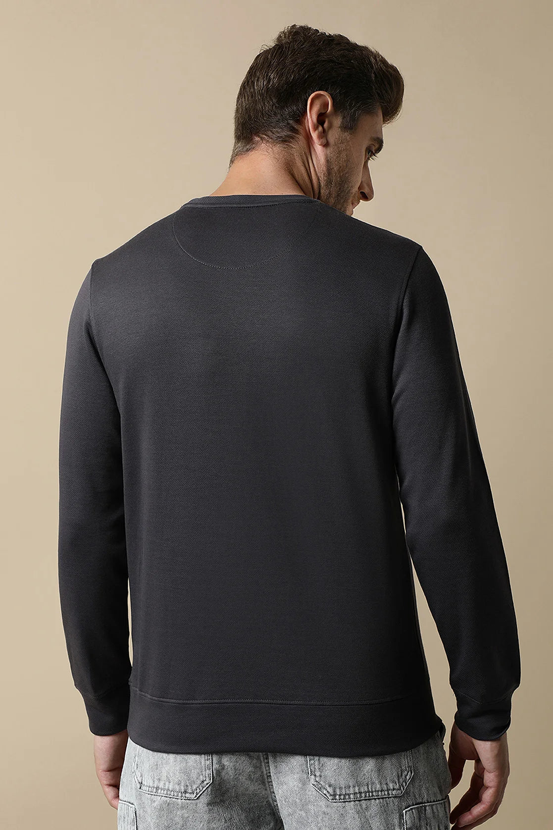 Discover the latest in men's fashion with Fort Collins' Dark Grey Sweatshirt featuring an Embroidered Chest Design. Shop now for a stylish wardrobe, available online in India.