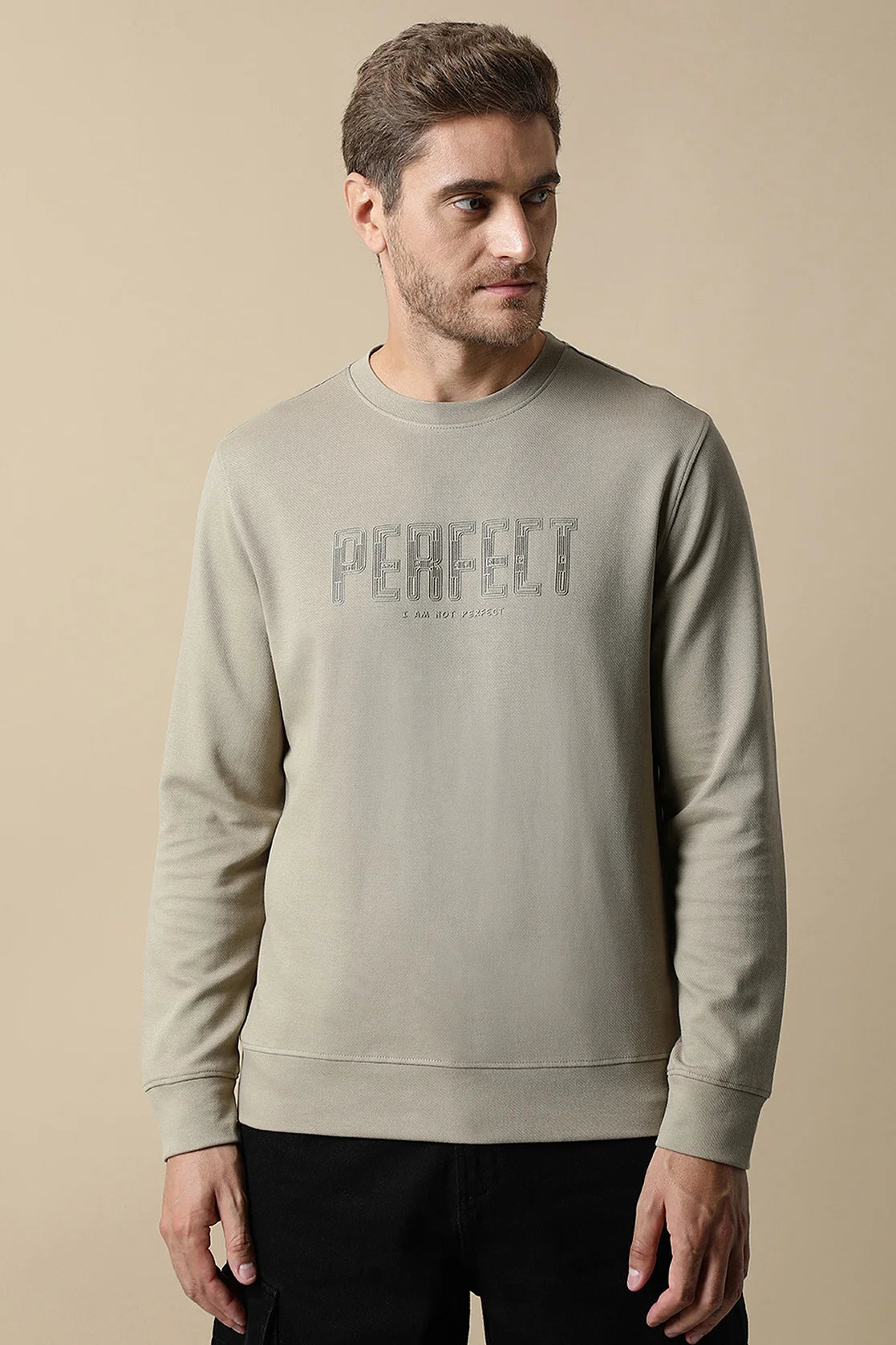 Discover the stylish wardrobe upgrade of the Men's Fawn Round Neck Sweatshirt with Embossed Chest Print by Fort Collins, available for online purchase from anywhere in India.