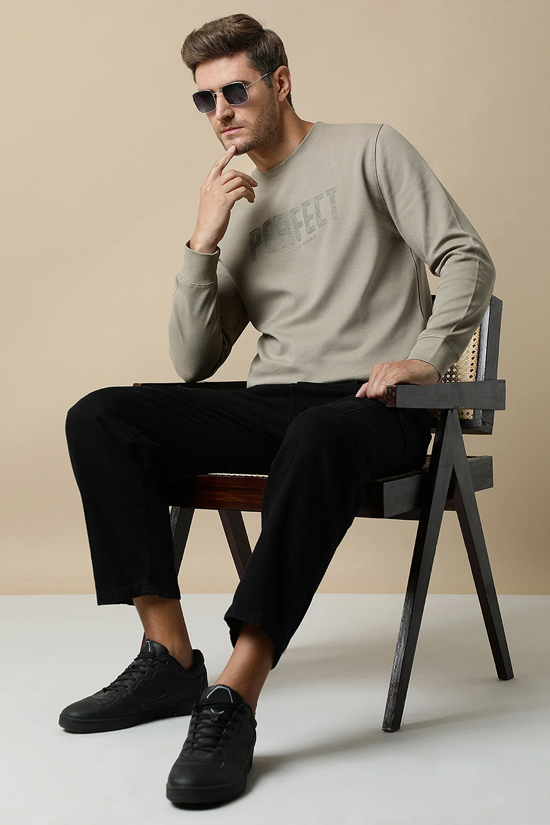 Upgrade your wardrobe with the Men's Fawn Round Neck Sweatshirt by Fort Collins. Enhance your style with the embossed chest print. Shop now for this trendy piece at any location in India.