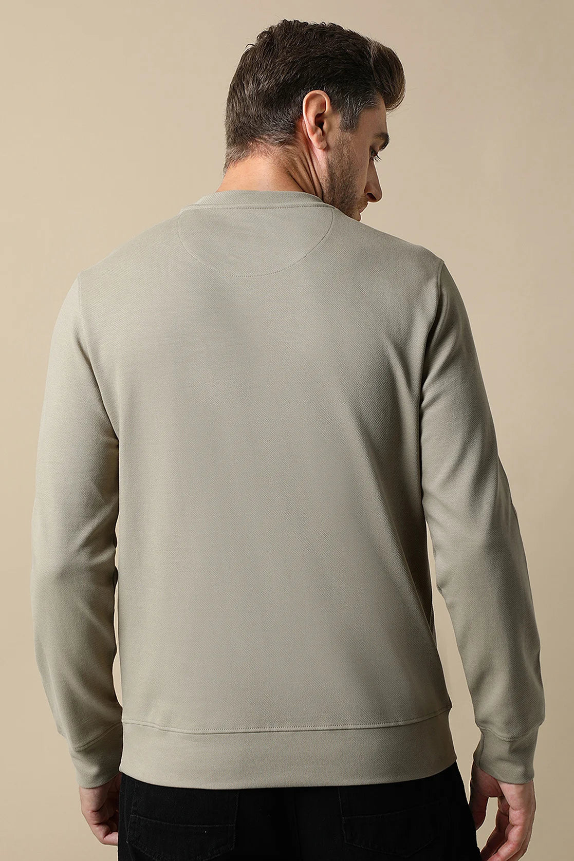 Upgrade your wardrobe with the Men's Fawn Round Neck Sweatshirt with Embossed Chest Print by Fort Collins. Shop now online and add a touch of trendiness to your look from anywhere in India.