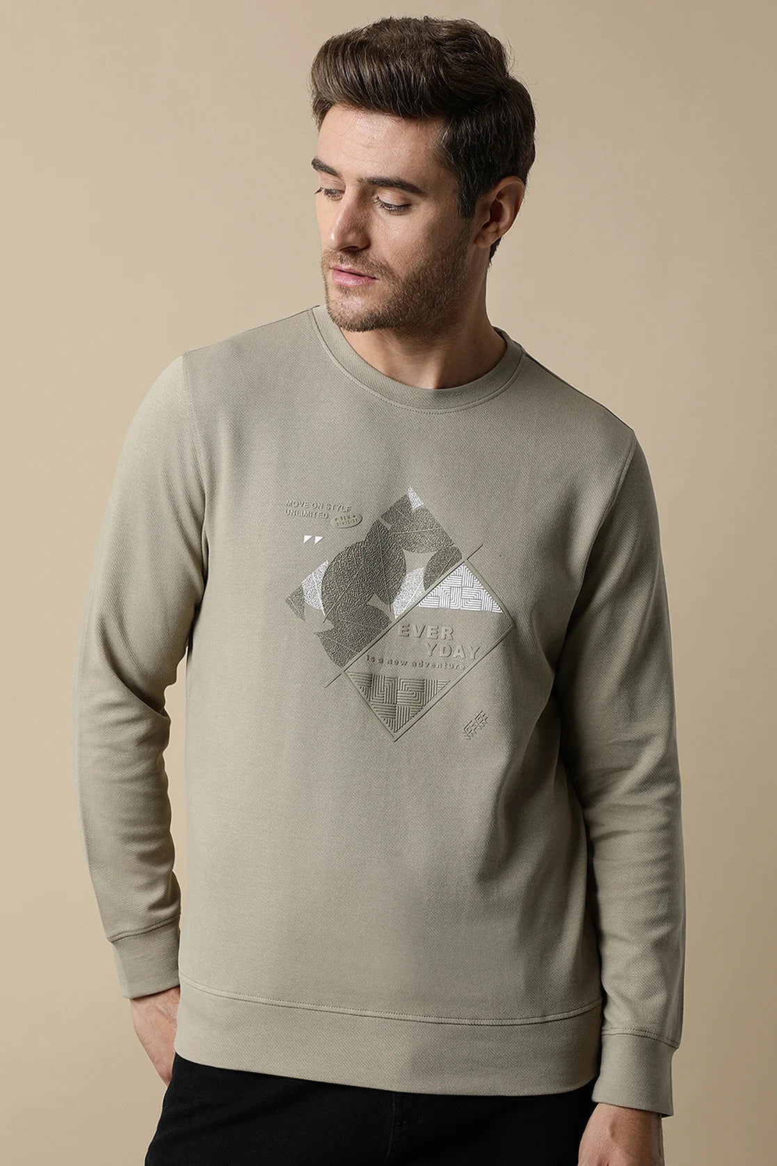 Discover the high-quality construction of the Men's Fawn Round Neck Sweatshirt from Fort Collins, made with durable diagonal interlock fabric and featuring an embossed graphic. Upgrade your wardrobe with this stylish option, available for online purchase from anywhere in India.