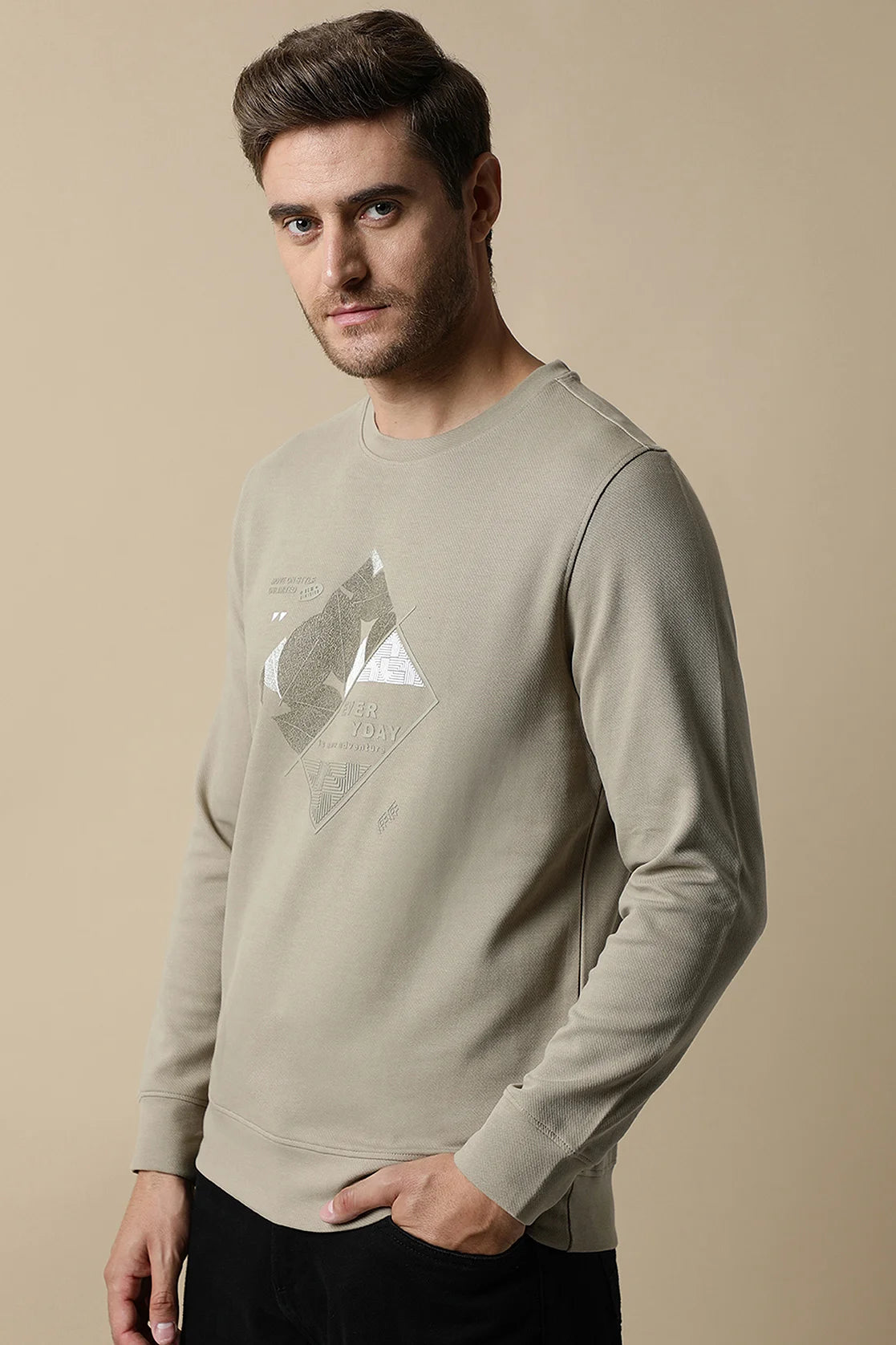 Elevate your wardrobe with our Men's Fawn Round Neck Sweatshirt, crafted with durable diagonal interlock material and featuring an embossed graphic. Shop now for a stylish look that can be delivered anywhere in India.