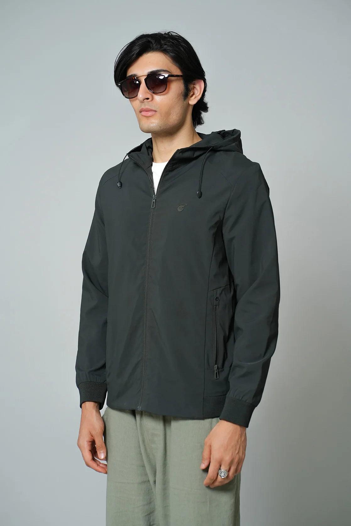 This Men's Dark Green Slim Fit Windbreaker Jacket with Adjustable Hood is available online in India from Fort Collins.