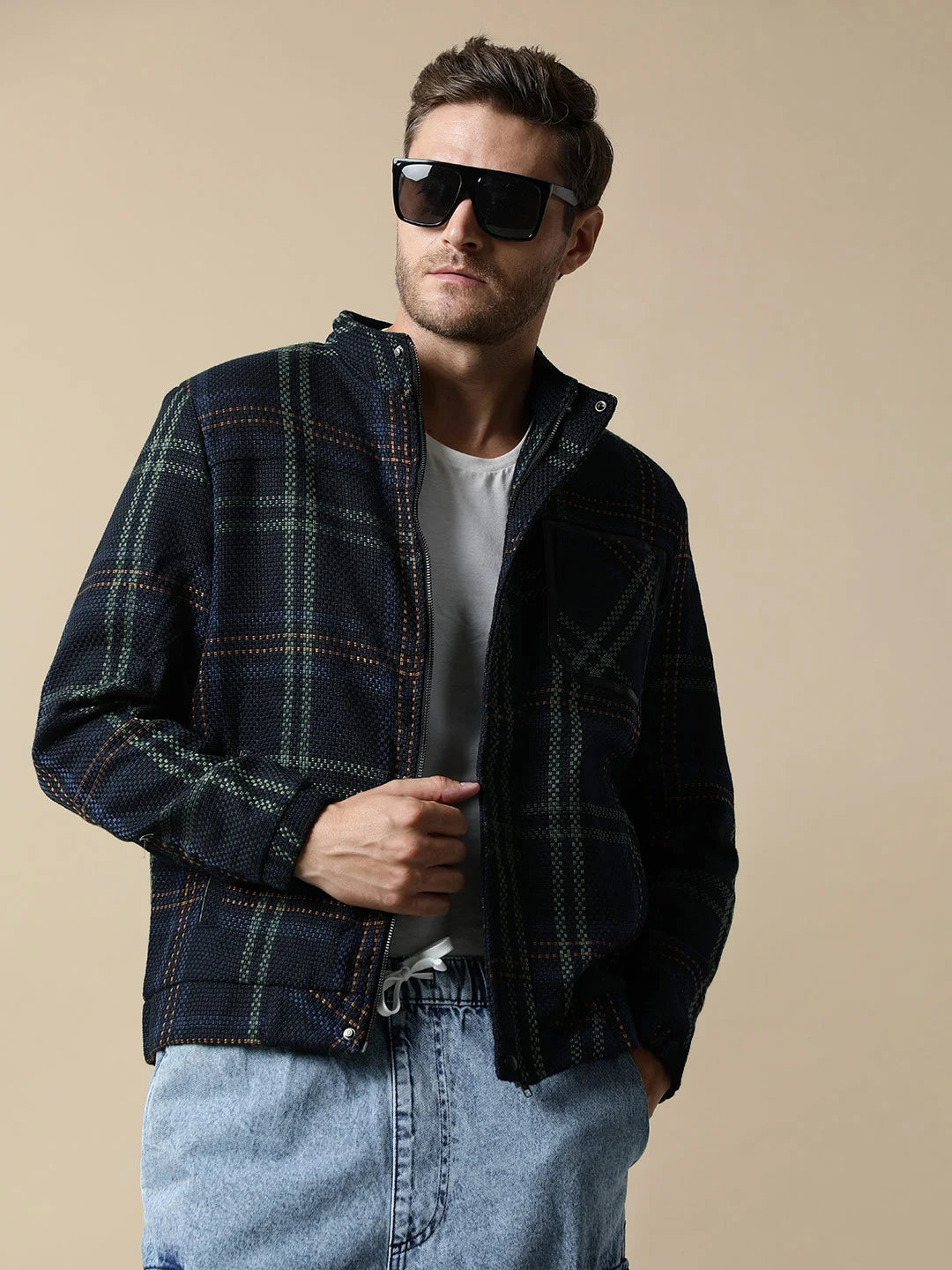 Elevate your fashion game with the stylish Men's Green Tweed Jacket from Fort Collins. Its quilted lining offers both comfort and warmth, making it the perfect addition to your wardrobe. Available for online purchase in India.