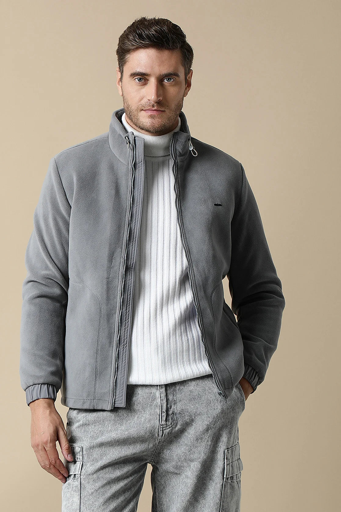 Upgrade your wardrobe with this Men's Grey Fleece Jacket by Fort Collins. Featuring a convenient Zip-Up Front, this trendy jacket is available online for purchase from anywhere in India.