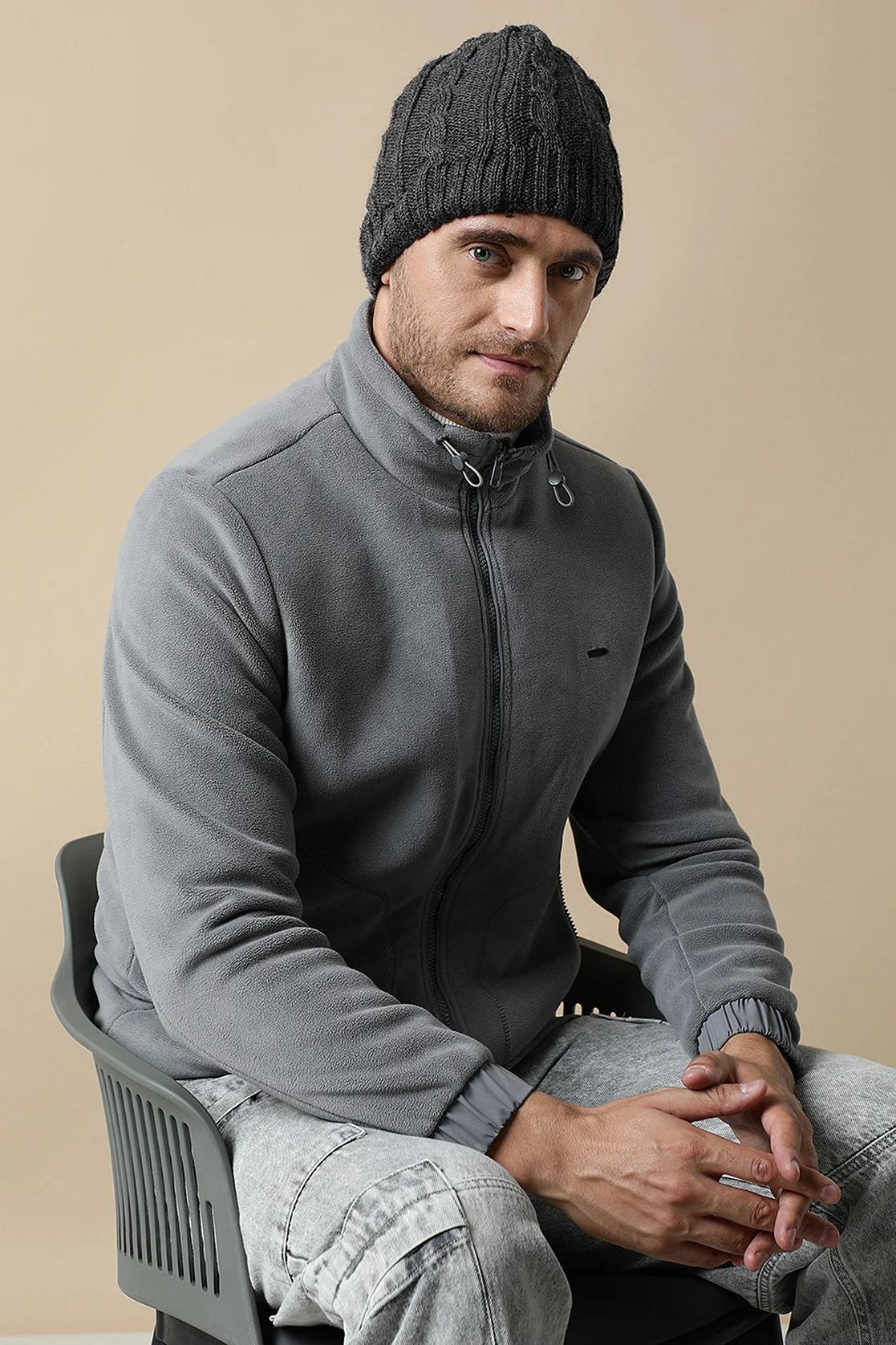 Enhance your wardrobe with our Men's Grey Fleece Jacket with Zip-Up Front from Fort Collins. Available online for a stylish upgrade to your wardrobe, no matter where you are in India.