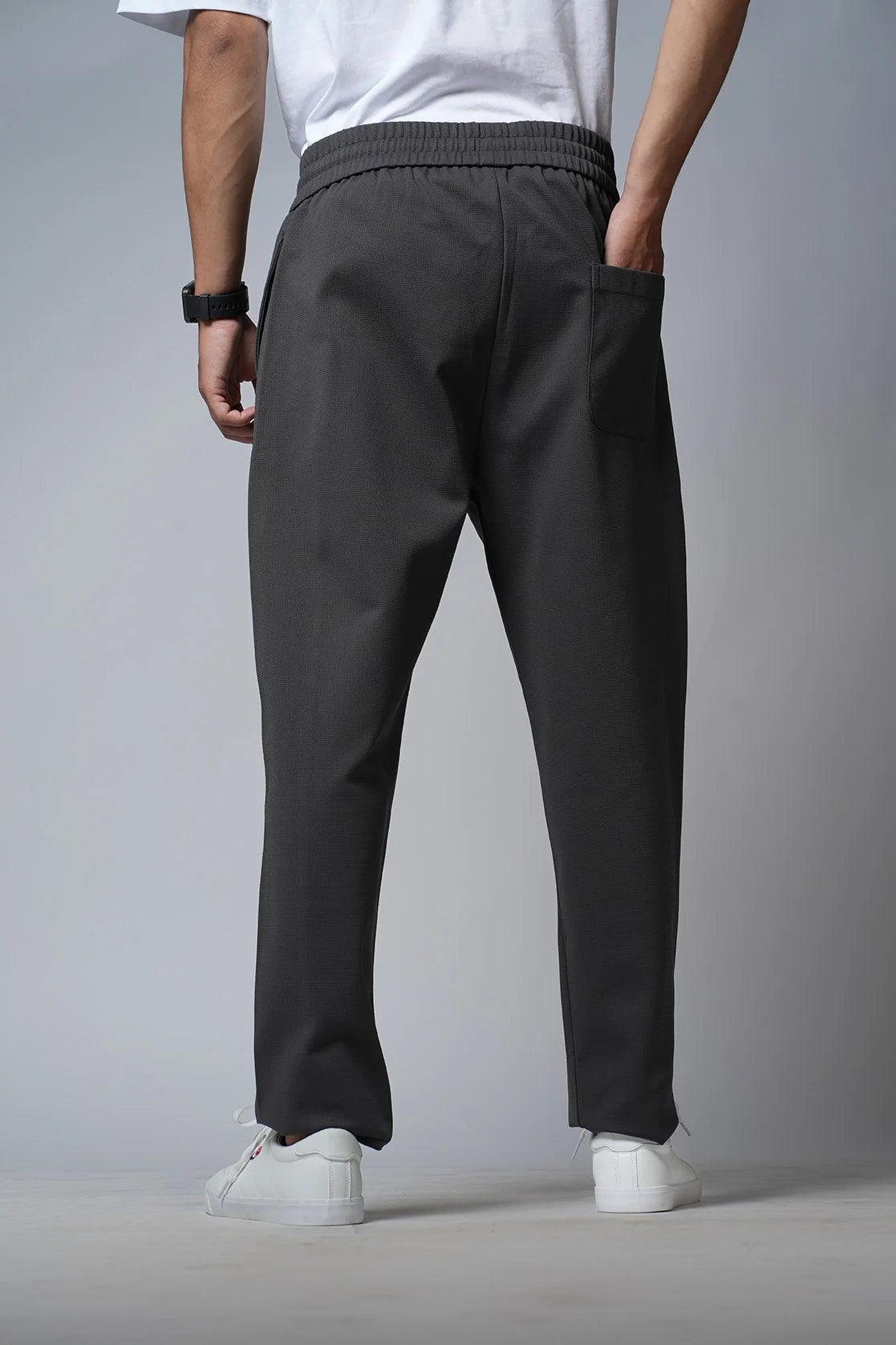 Shop for Men's Grey Regular Fit Polyester Track Pant with Zipper Pockets from Fort Collins Online in India.