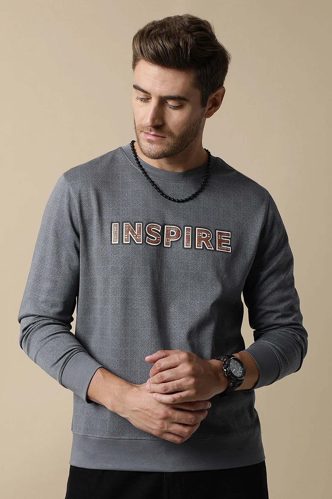 Discover the ultimate wardrobe addition with our Men's Grey Round Neck Sweatshirt, featuring a Chest Print design from Fort Collins. Expand your style options with our online shopping feature, available nationwide in India.