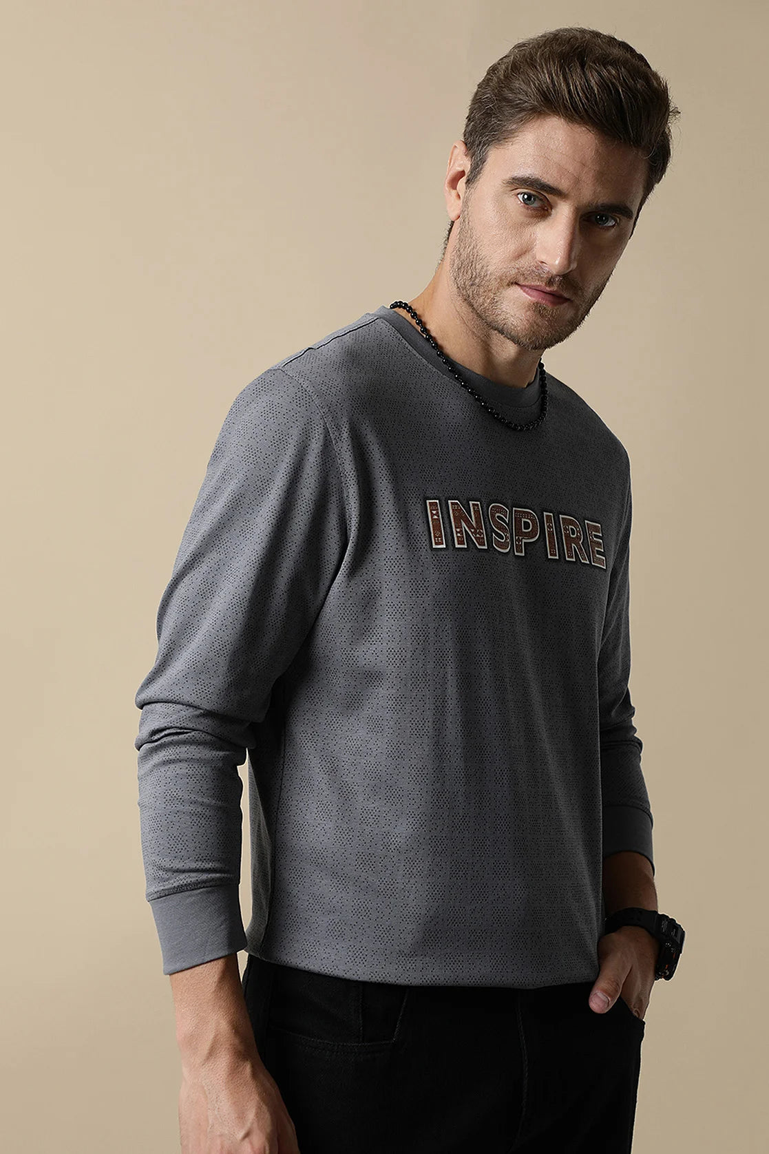 Discover the stylish Men's Grey Round Neck Sweatshirt with Chest Print, created by Fort Collins. Experience the convenience of shopping online from anywhere in India for the latest fashion trends.