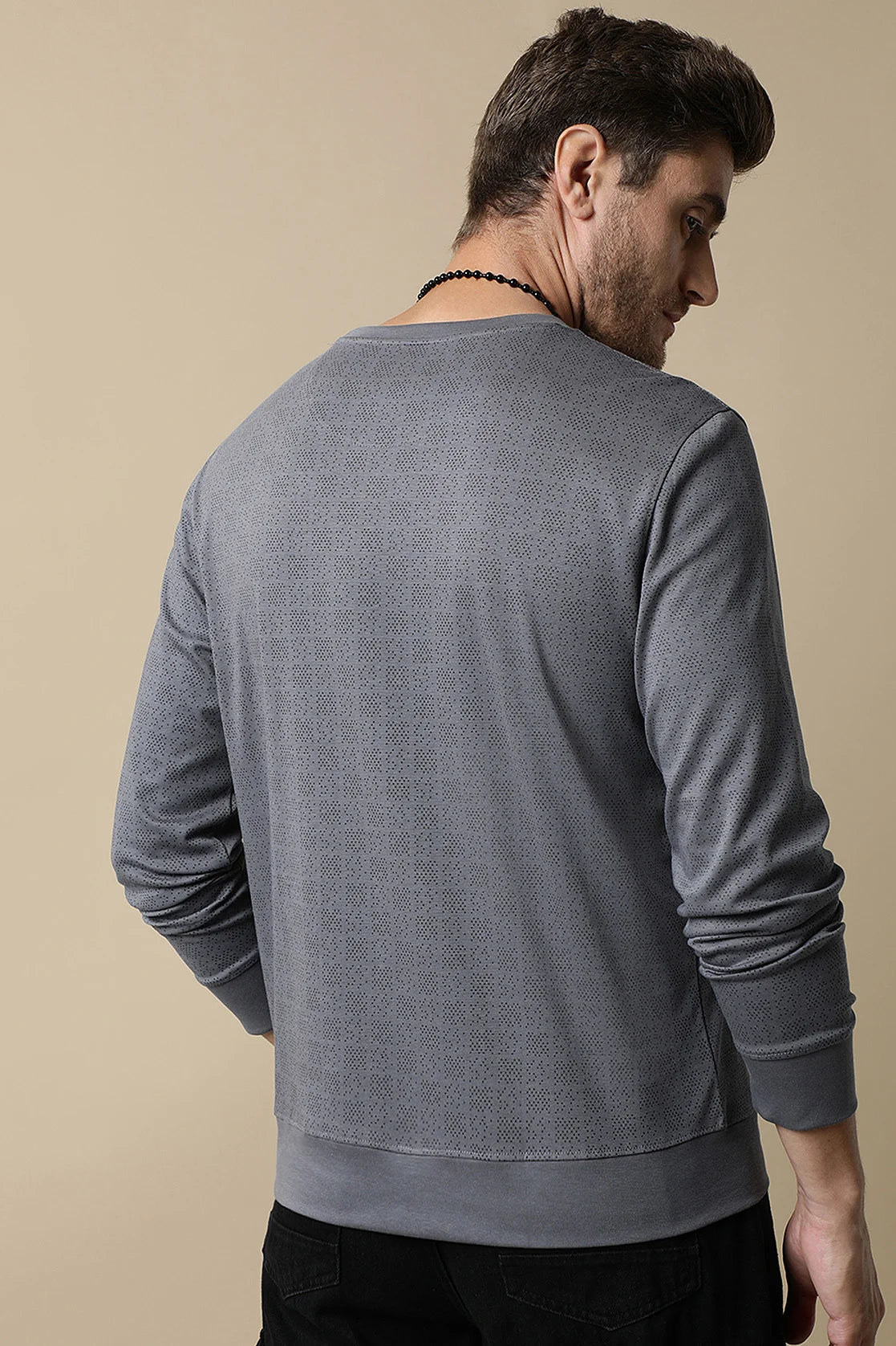 Discover the fashionable Men's Grey Round Neck Sweatshirt with Chest Print from Fort Collins. Experience the convenience of shopping online for a stylish wardrobe in India.