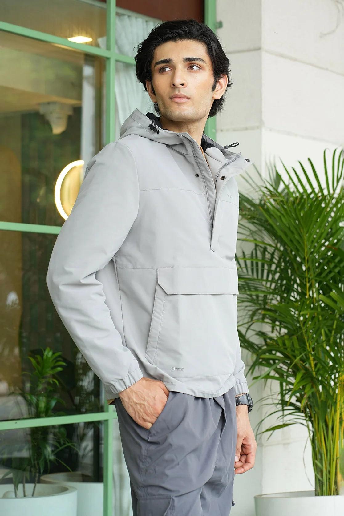 This Men's Grey Windbreaker Jacket from Fort Collins features an adjustable hood and mesh lining. It is available for online purchase in India.