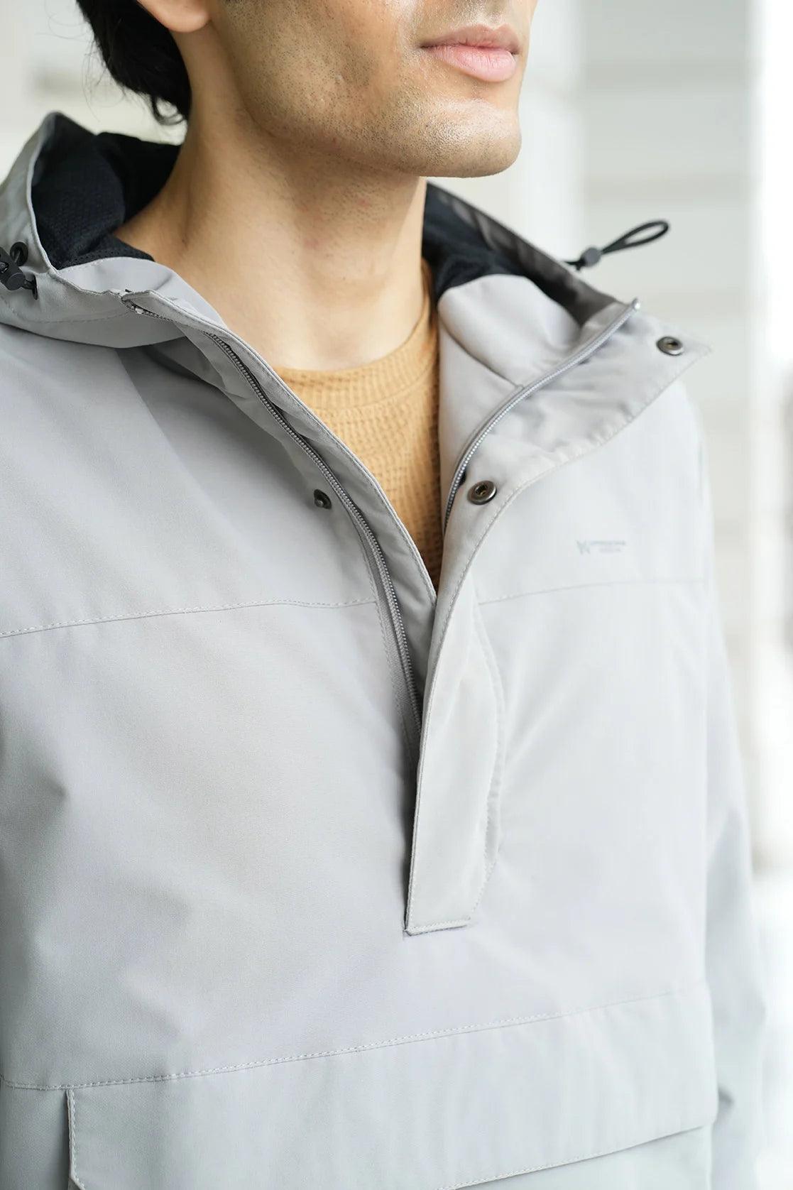 Discover the versatility and comfort of the Fort Collins Men's Grey Windbreaker Jacket. Featuring an adjustable hood and mesh lining, this jacket is the perfect choice for any man. Available online in India.