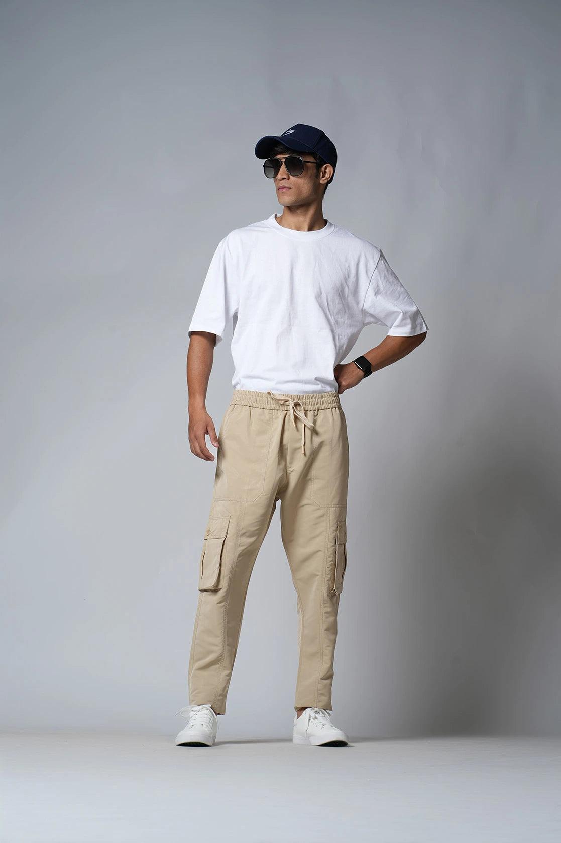 Discover the Men's Khaki Regular Fit Cotton Cargo Track Pant from Fort Collins, now available for purchase online in India.