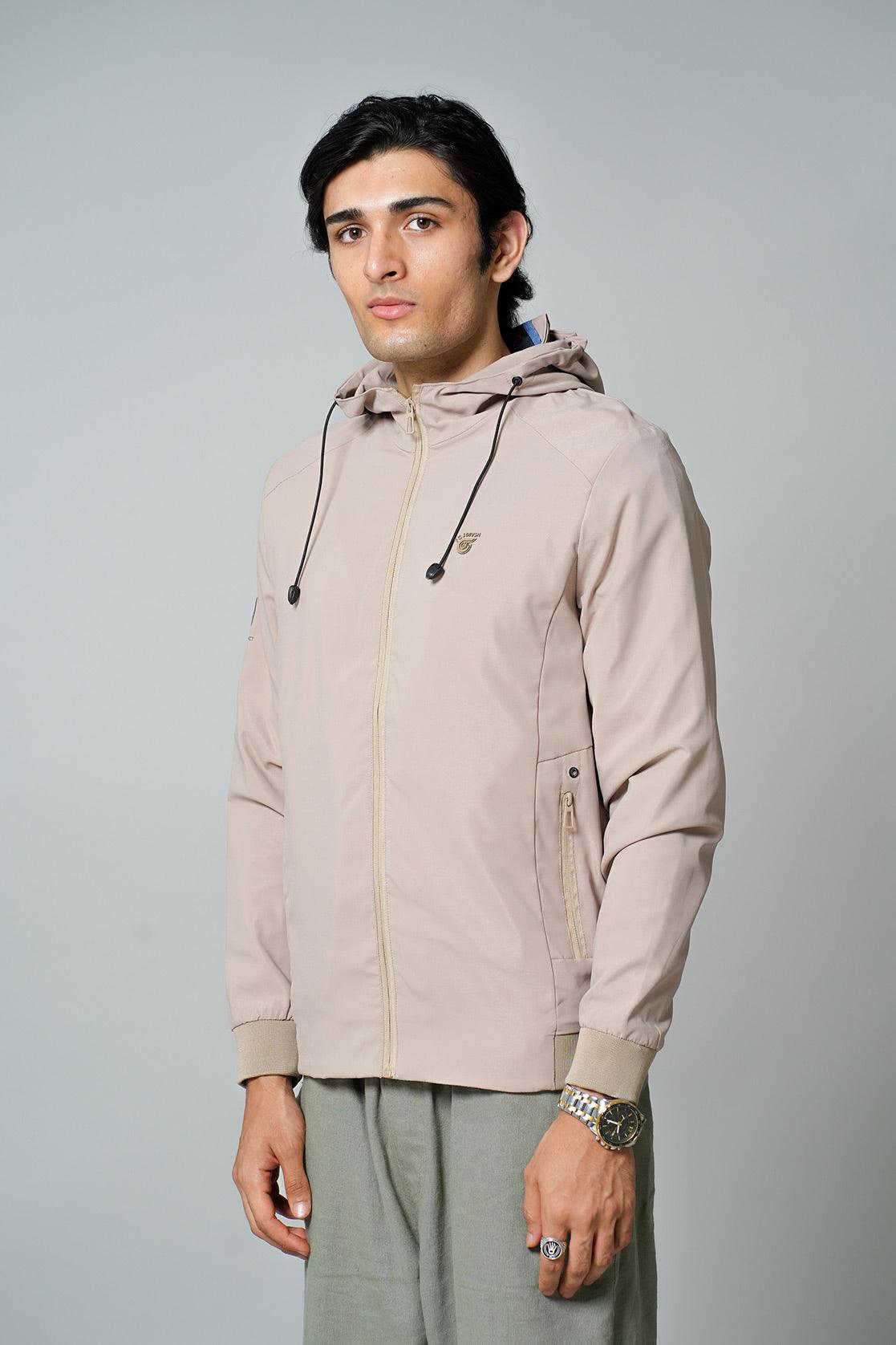 This windbreaker jacket, designed with a slim fit and adjustable hood, is available for purchase online in India from the Fort Collins brand.