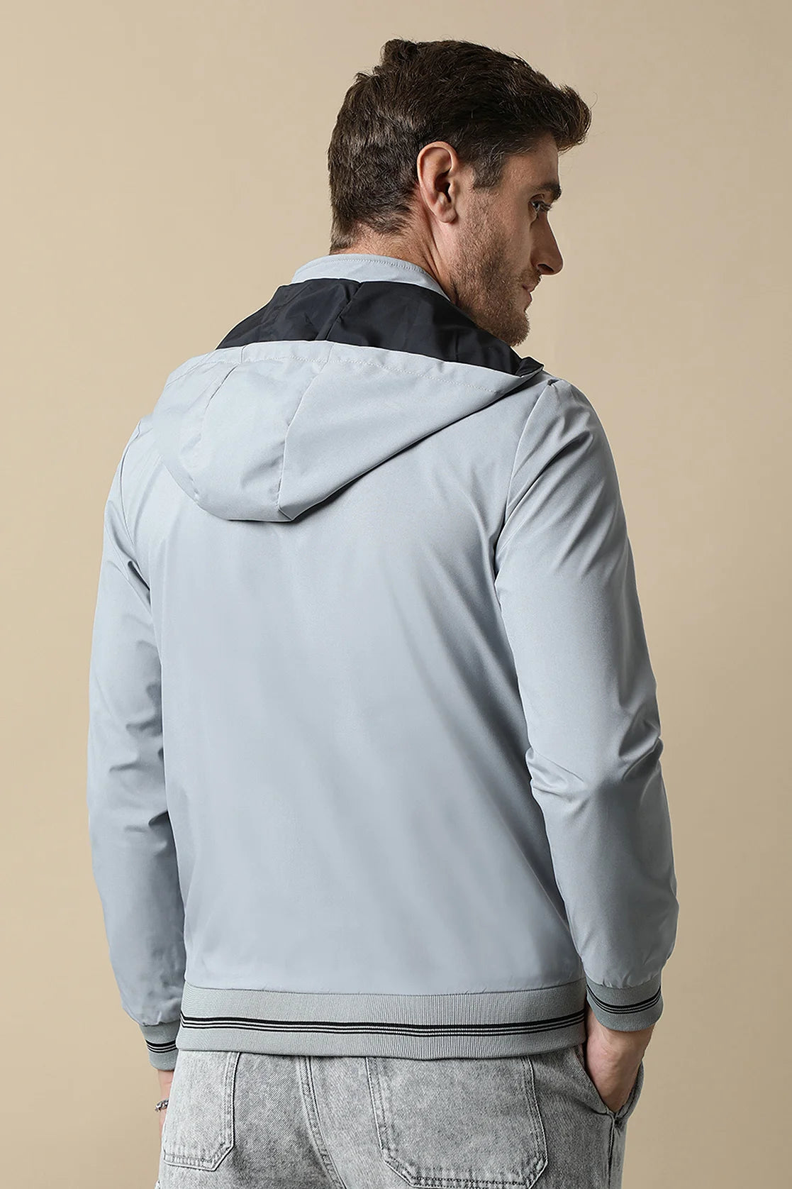 Shop online in India for a fashionable addition to your wardrobe: the Fort Collins Men's Light Grey Reversible Windbreaker with a detachable hood.