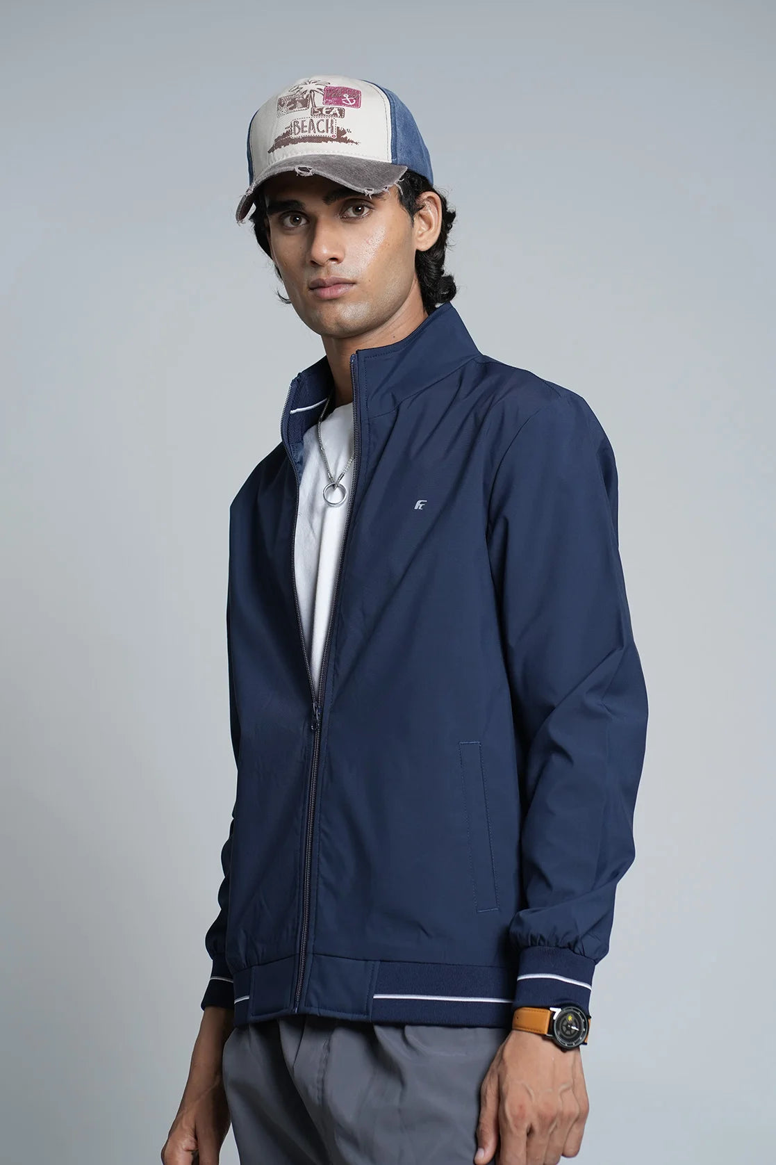 Upgrade your wardrobe with this Fort Collins Men's Lightweight Navy Blue Windbreaker Jacket, perfect for any location and available for purchase online in India.