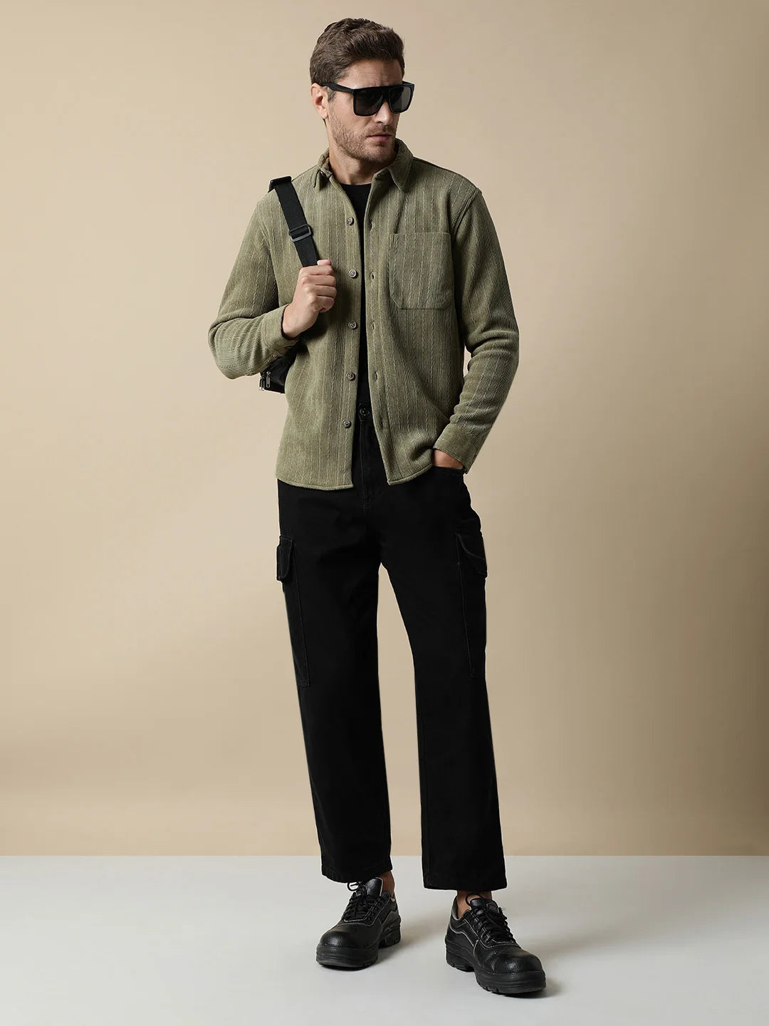 Shop for a fashionable wardrobe update anywhere in India with the Men's Olive Green Knitted Button Down Shacket from Fort Collins. Get your hands on this stylish piece now.