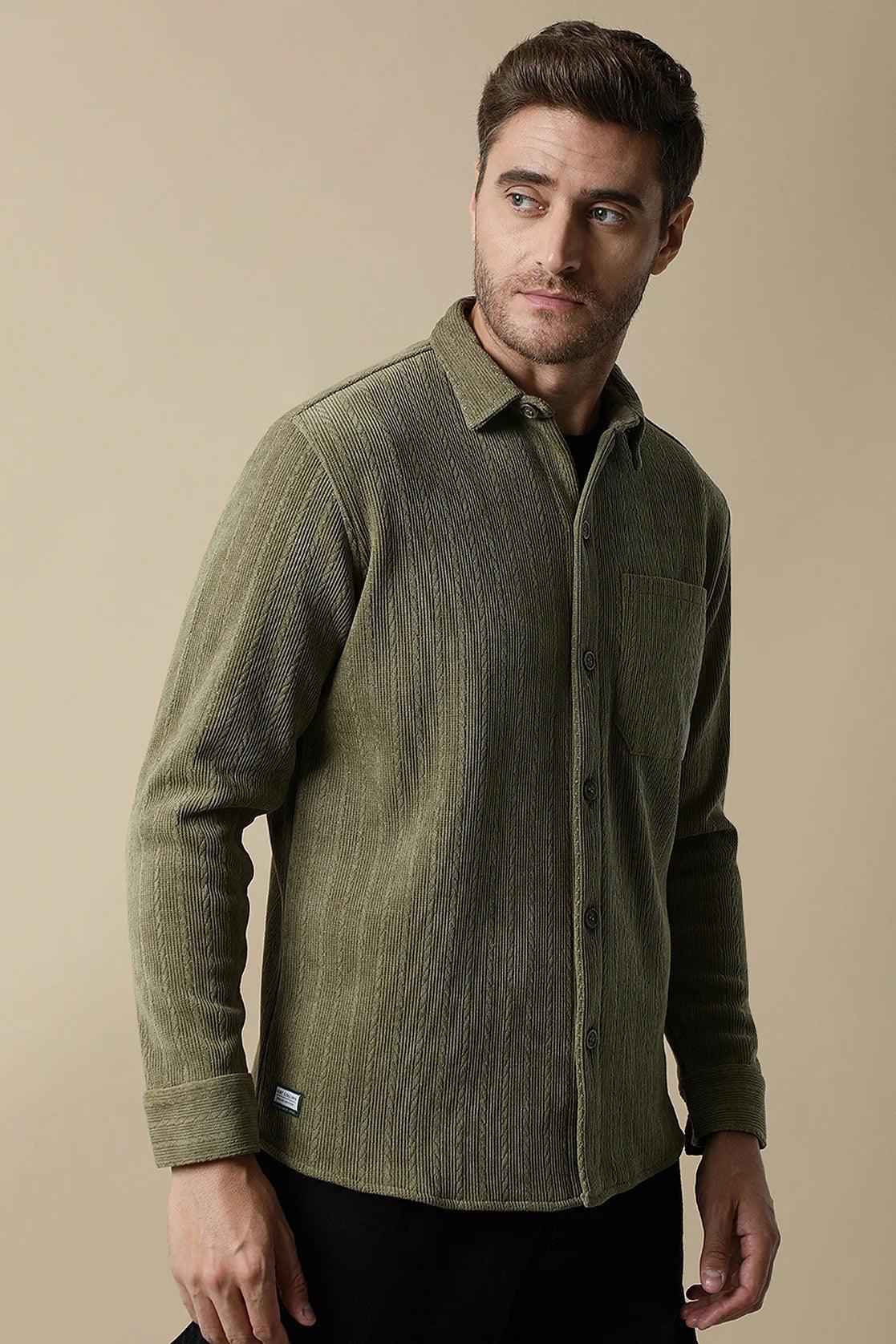 Upgrade your wardrobe with the trendy Olive Green Knitted Button Down Shacket for men by Fort Collins, available for online purchase from anywhere in India.