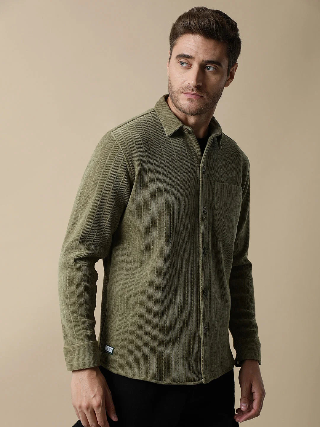 Upgrade your wardrobe with the Men's Olive Green Knitted Button Down Shacket by Fort Collins, available for online purchase across India. Enhance your style with this trendy and versatile fashion piece.