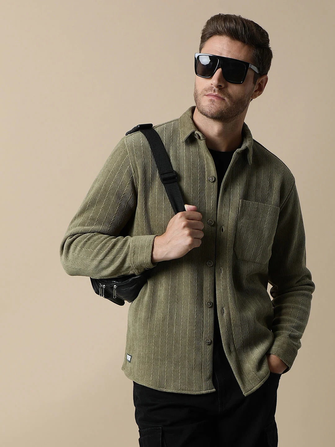 Upgrade your wardrobe with the trendy Men's Olive Green Knitted Button Down Shacket by Fort Collins. Shop online from anywhere in India for a stylish addition.