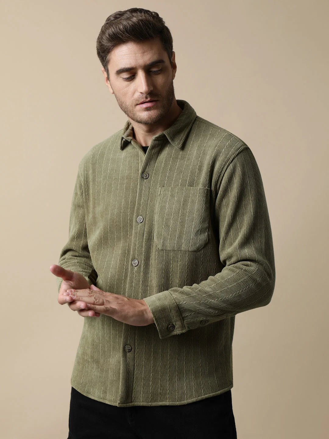 Upgrade your wardrobe with the Men's Olive Green Knitted Button Down Shacket by Fort Collins. Shop now for a fashionable addition to your closet, all available for purchase online from anywhere in India.