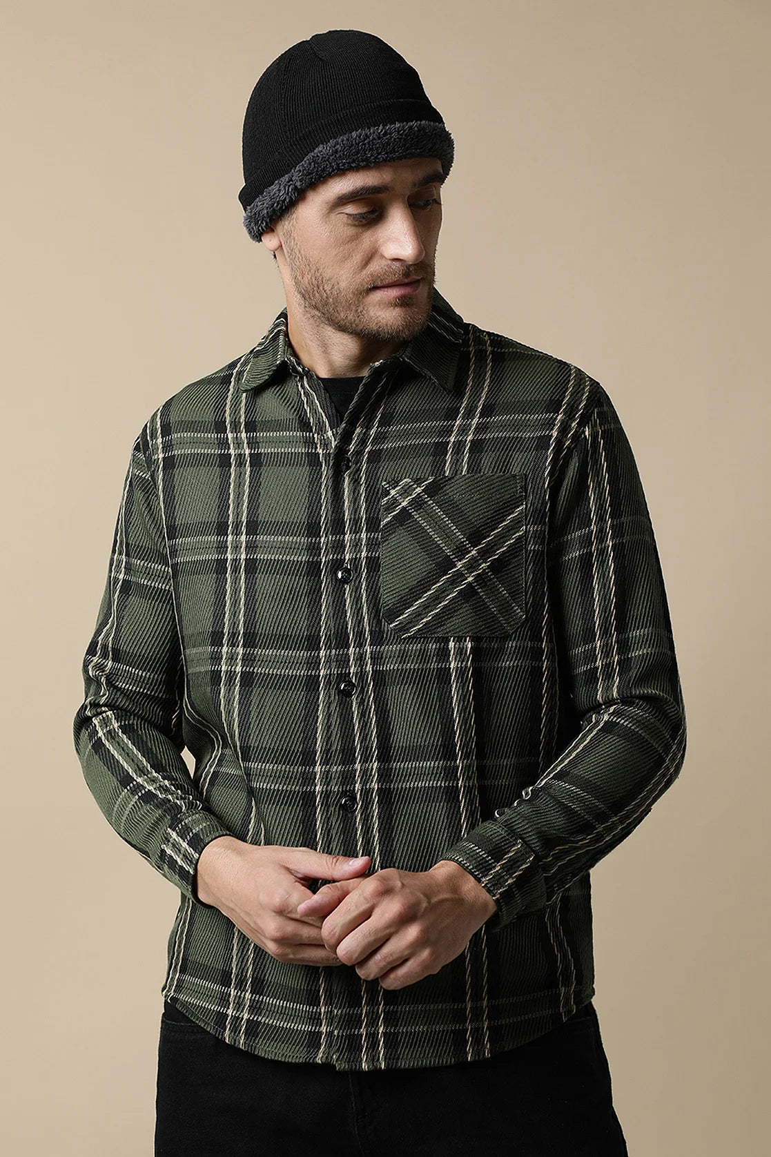 Experience a fashionable upgrade to your wardrobe with the Men's Olive Green Knitted Plaid Shacket, available online from anywhere in India. Trust Fort Collins for the latest trends in men's fashion.