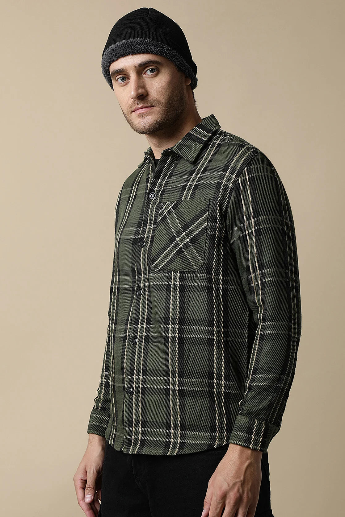 Upgrade your wardrobe with the trendy Olive Green Knitted Plaid Shacket for men by Fort Collins. Experience the convenience of online shopping from anywhere in India.