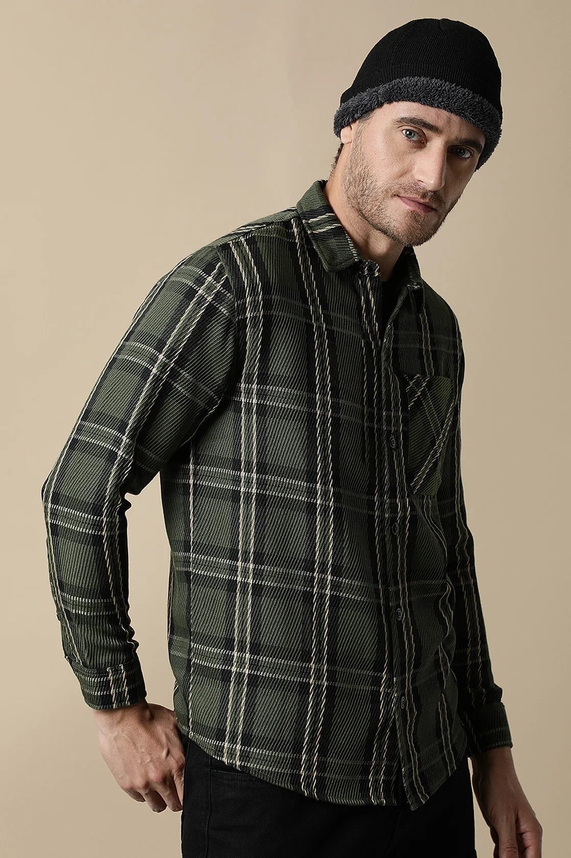 Step up your wardrobe game with the Men's Olive Green Knitted Plaid Shacket by Fort Collins. Explore our online collection and elevate your style from any part of India.