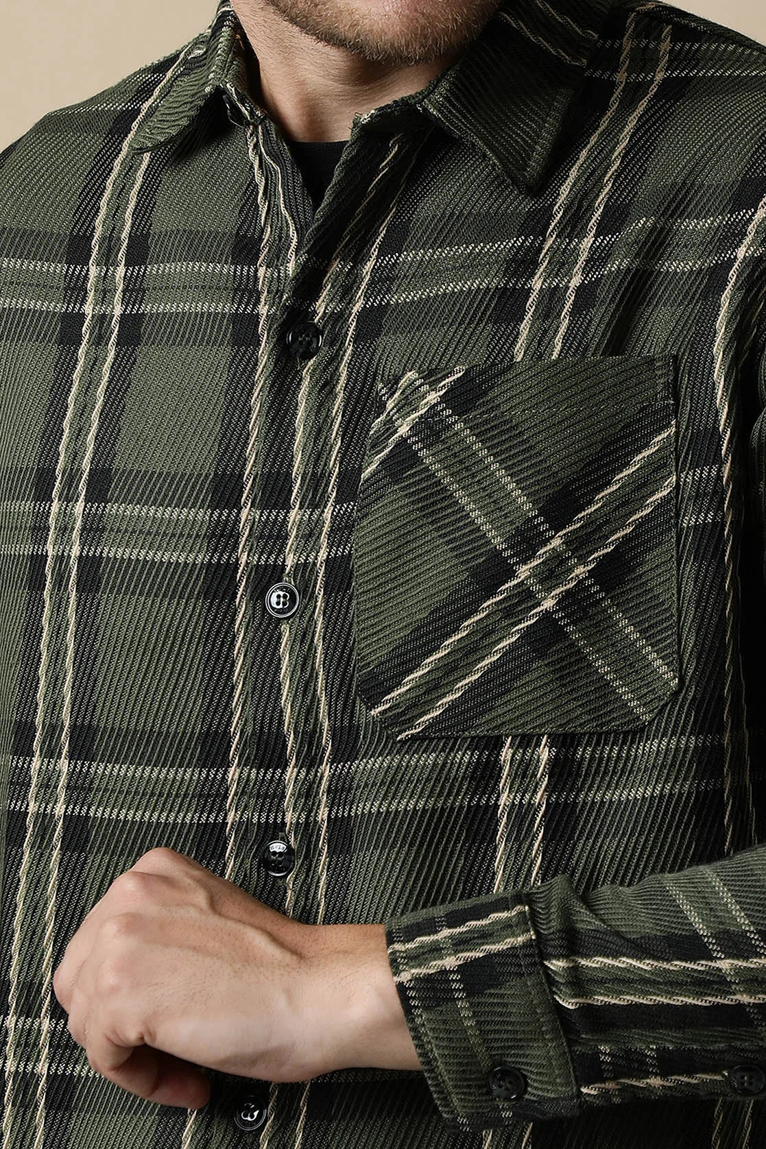 Upgrade your wardrobe with the trendy Men's Olive Green Knitted Plaid Shacket by Fort Collins. Shop online now from anywhere in India.