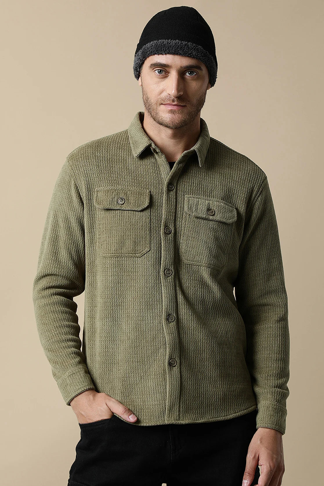 Discover the versatile and stylish Men's Olive Green Textured Shacket with Dual Chest Pockets from Fort Collins. Upgrade your wardrobe effortlessly with our convenient online shopping from anywhere in India.