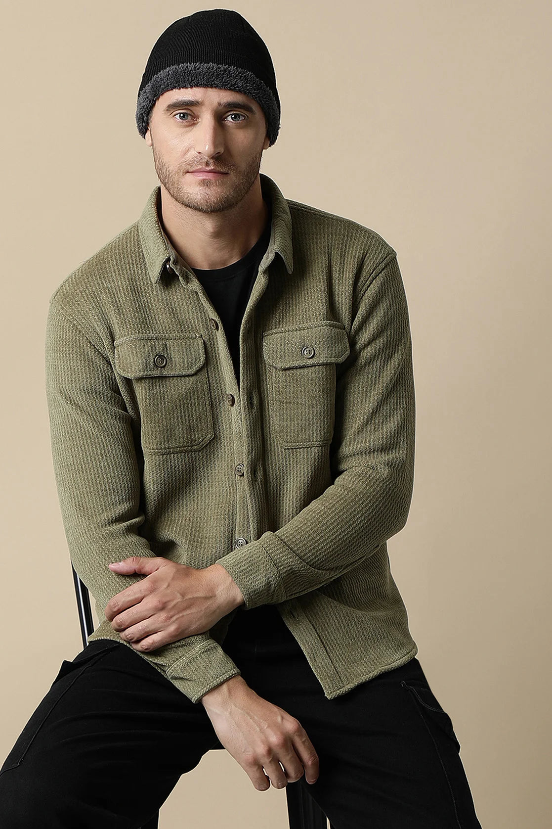 Discover the ultimate fashion statement with the Fort Collins Men's Olive Green Textured Shacket. Featuring dual chest pockets, this versatile piece will elevate your wardrobe and can be purchased online from anywhere in India.