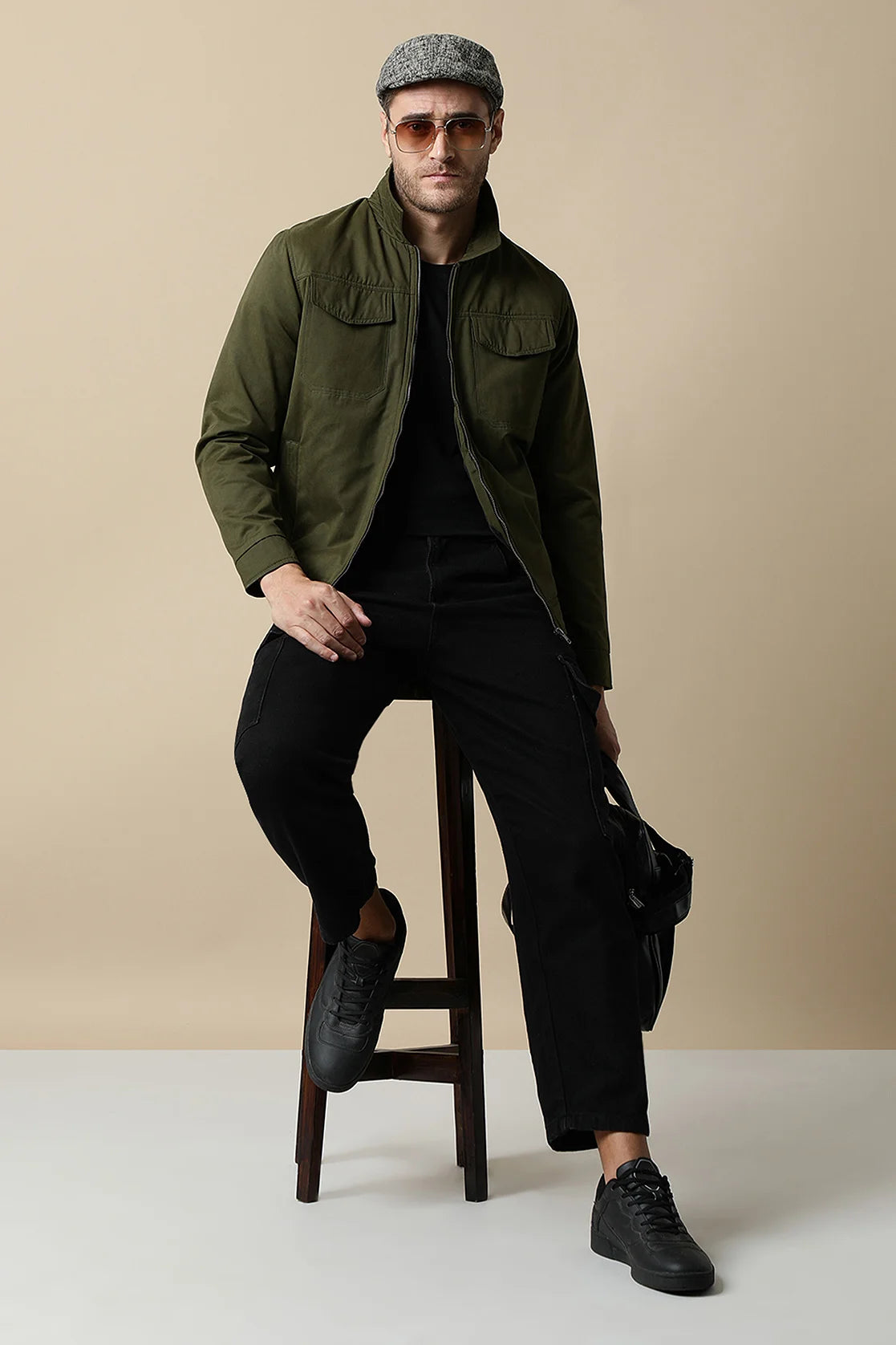 Upgrade your wardrobe with the Fort Collins Men's Olive Lightweight Jacket. This jacket features dual chest pockets for added convenience. Shop now from any location in India.