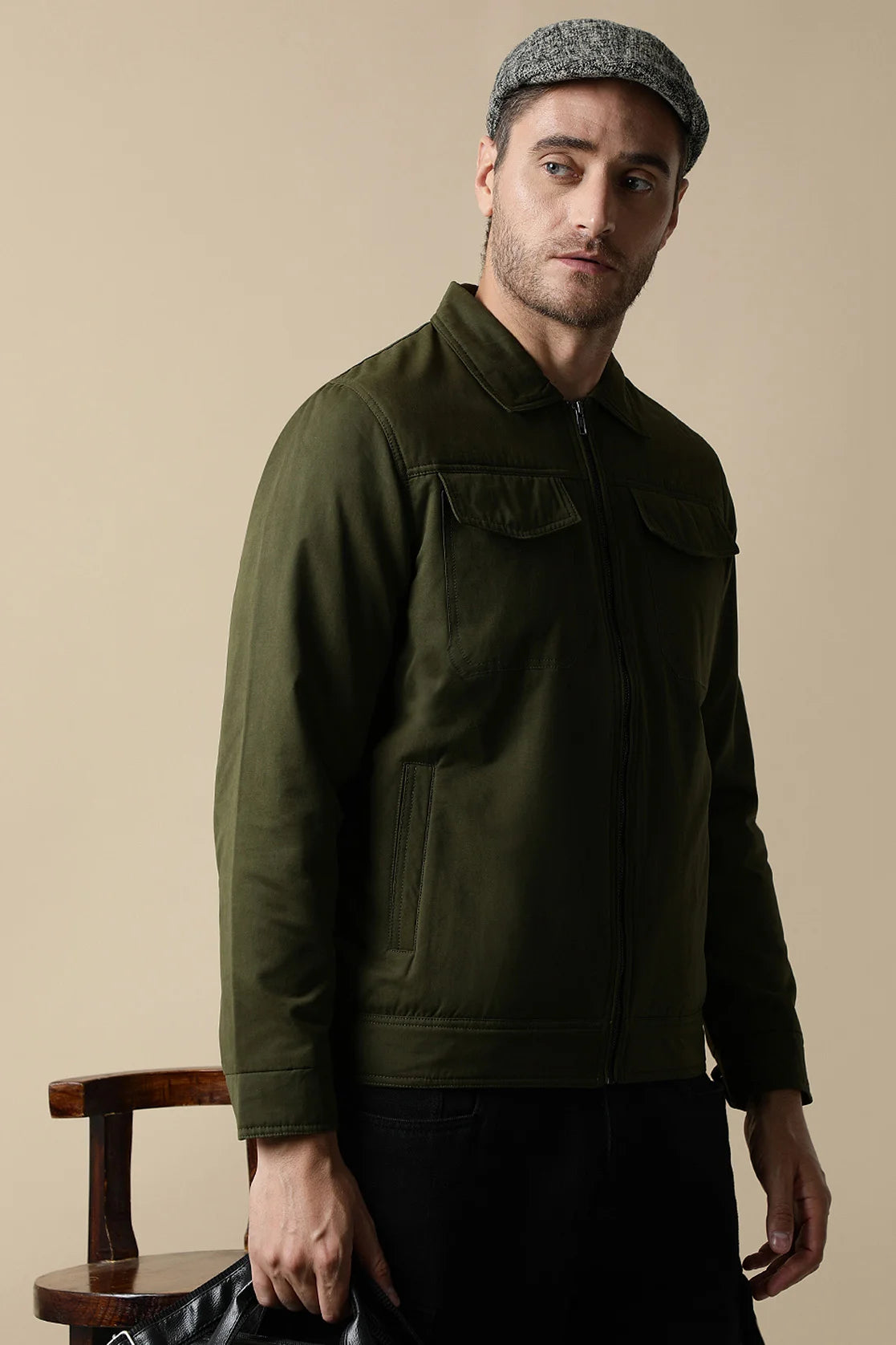 Upgrade your wardrobe with the Fort Collins Men's Olive Lightweight Jacket, featuring dual chest pockets. Shop now and improve your style from anywhere in India.