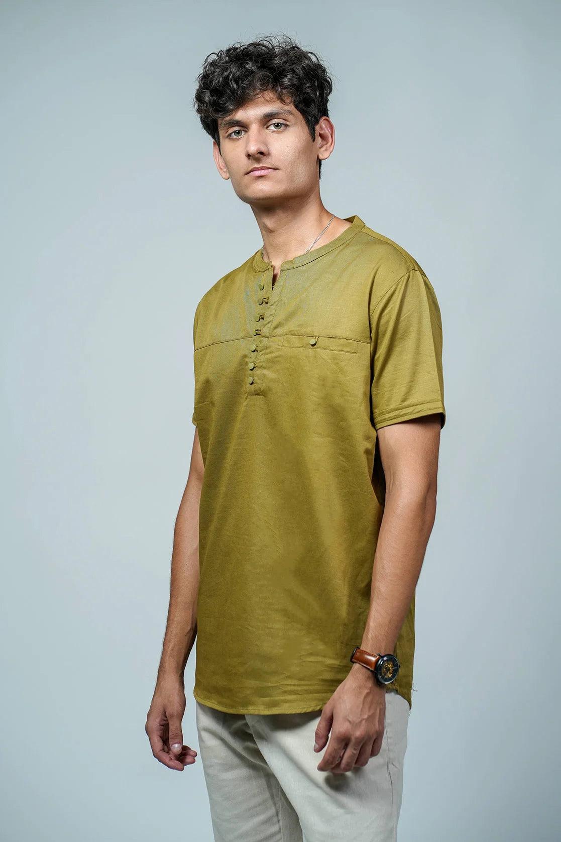 Crafted by industry experts, the Men's Olive Relaxed Fit Mandarin Collar T-Shirt Kurta features a chest pocket and a relaxed fit, making it both functional and stylish.