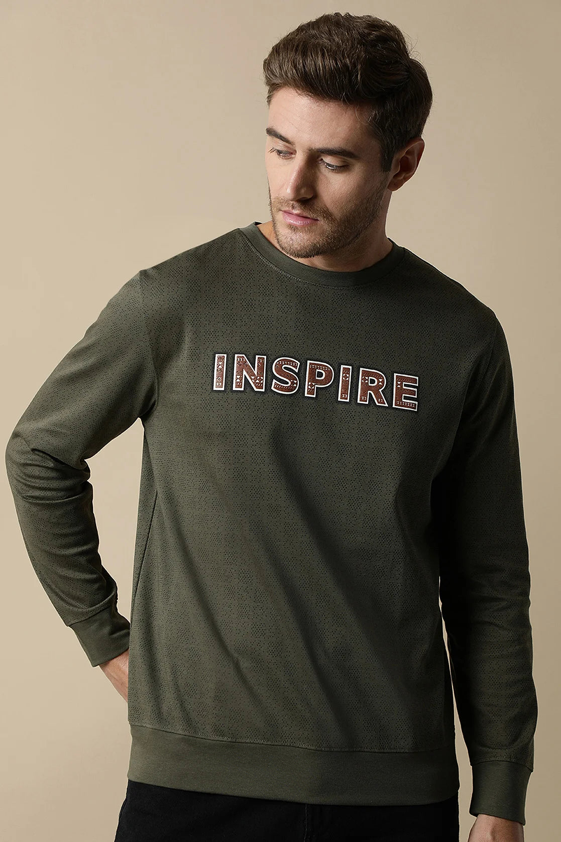 Enhance your wardrobe with the Men's Olive Round Neck Sweatshirt from Fort Collins. This stylish piece is available for purchase online, making it a convenient and fashionable choice for customers throughout India.