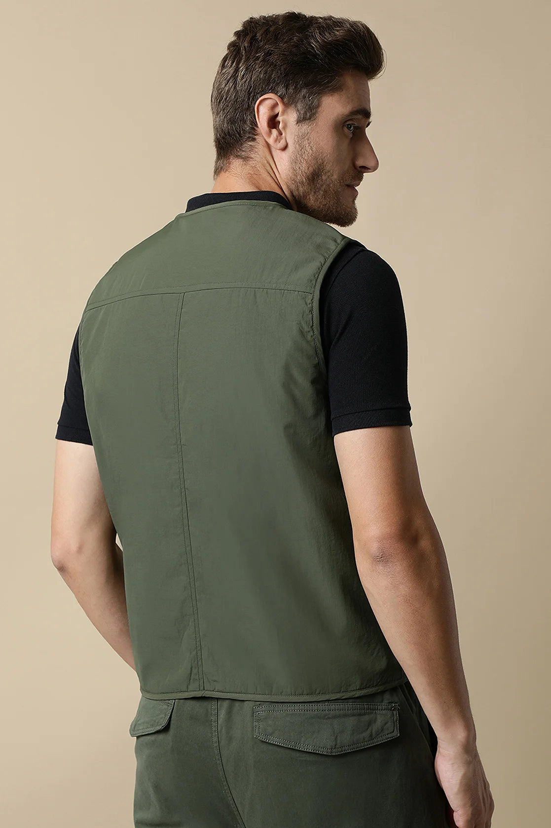 Elevate your wardrobe with the Men’s Olive Tactical Utility Vest Jacket by Fort Collins. Featuring a trendy design, this jacket is a must-have for any fashion-savvy individual in India. Shop online now to upgrade your style game.