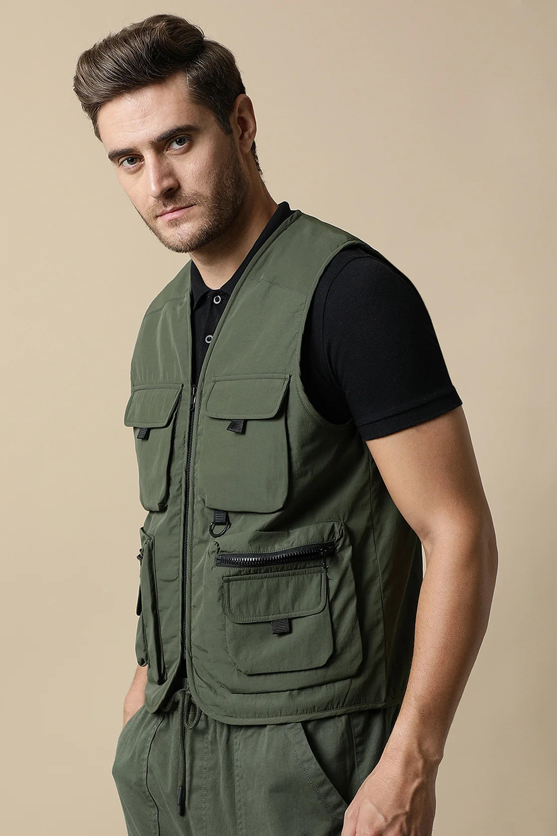 Elevate your wardrobe with the Men’s Olive Tactical Utility Vest Jacket from Fort Collins. This premium jacket is available online, making it convenient for any location in India.