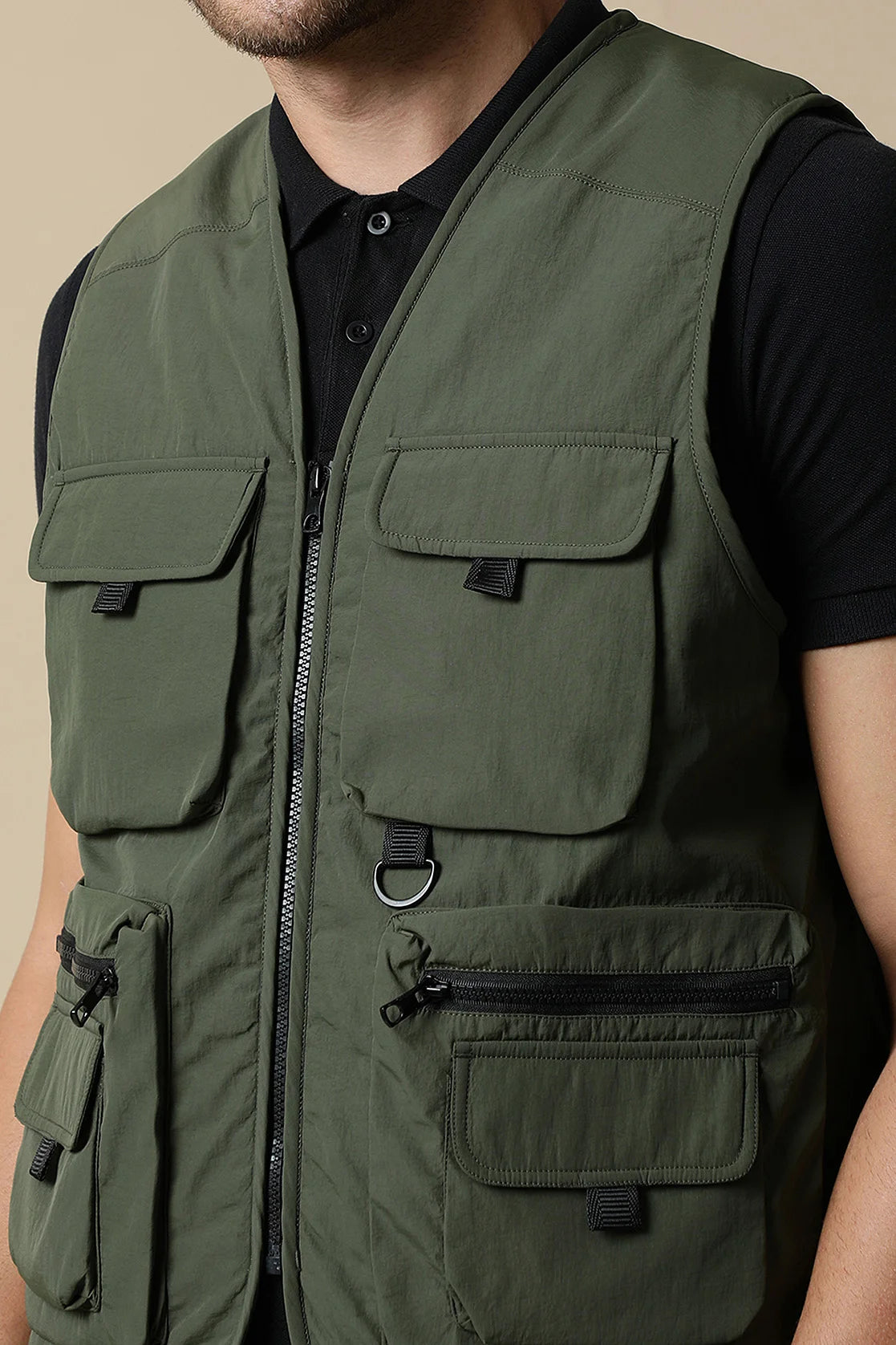 Upgrade your wardrobe with the Men's Olive Tactical Utility Vest Jacket by Fort Collins. Available online for purchase from anywhere in India.