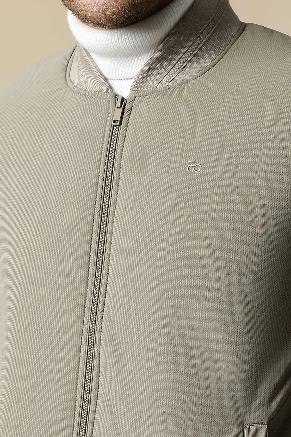 Elevate your wardrobe with the Fort Collins Men's Sage Green Lightweight Jacket featuring a ribbed collar. Purchase online now for a stylish upgrade, available anywhere in India.