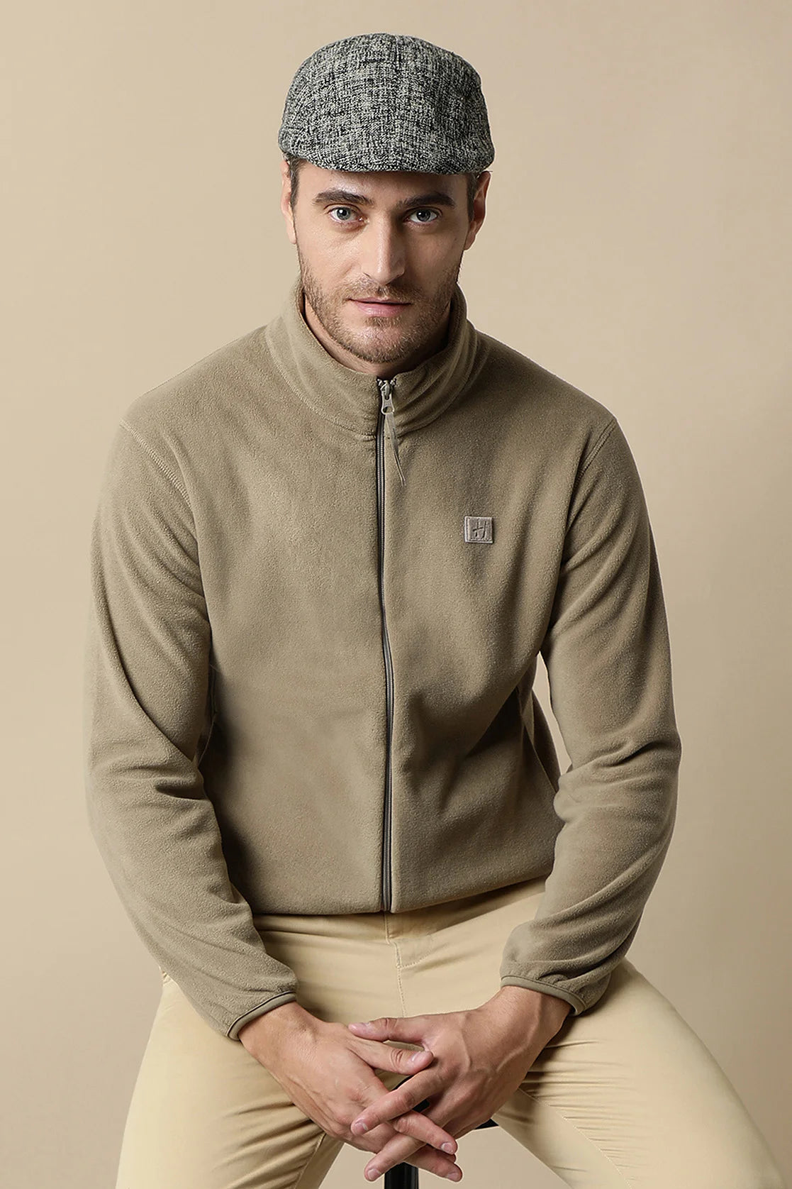 Discover the trendiest wardrobe addition with the Fort Collins Men's Tan Full-Zip Fleece Sweatshirt, available for online shopping from anywhere in India.