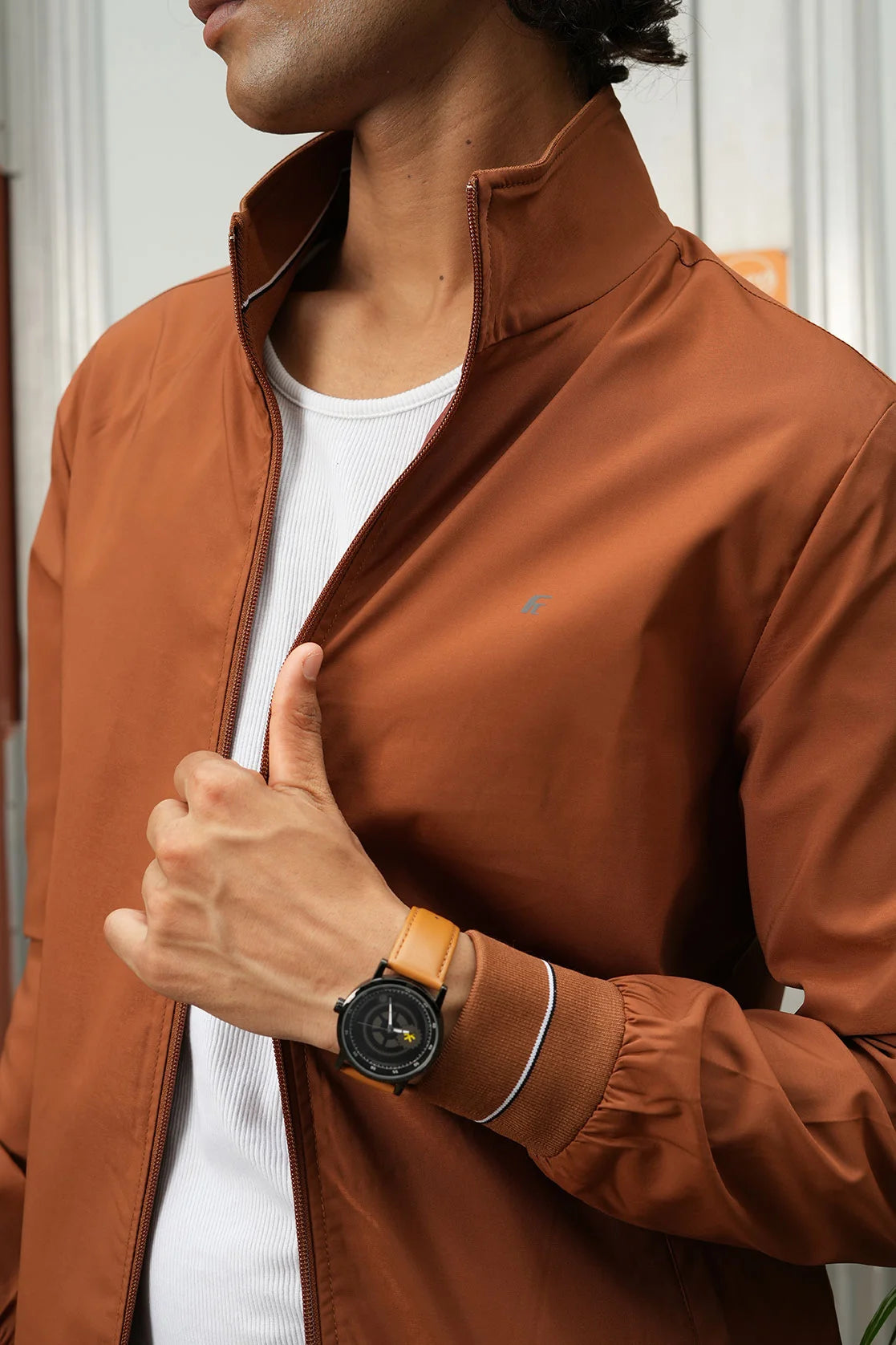 Upgrade your wardrobe with the trendy Men's Tan Lightweight Windbreaker Jacket from Fort Collins. Shop online now for a stylish and lightweight option, available in India.