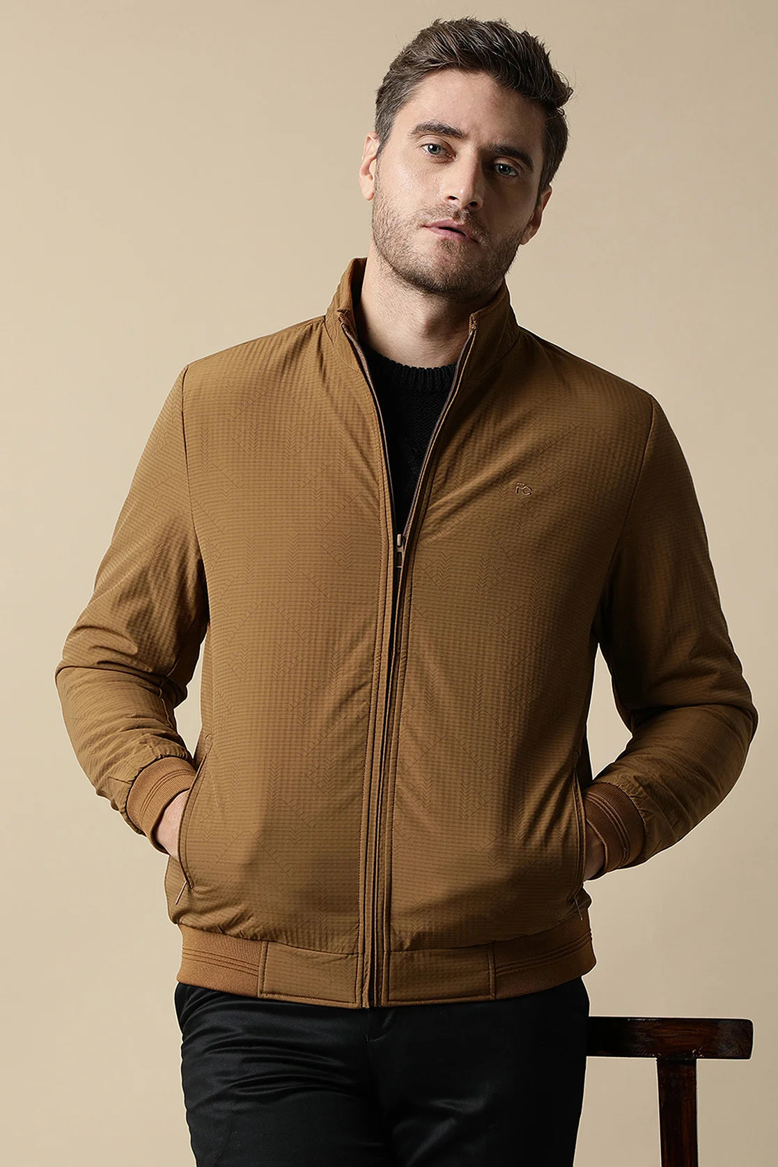 Upgrade your wardrobe with the Men's Tan Textured Lightweight Jacket by Fort Collins, now available for purchase online from anywhere in India. Don't miss out on this trendy and stylish addition to your collection.