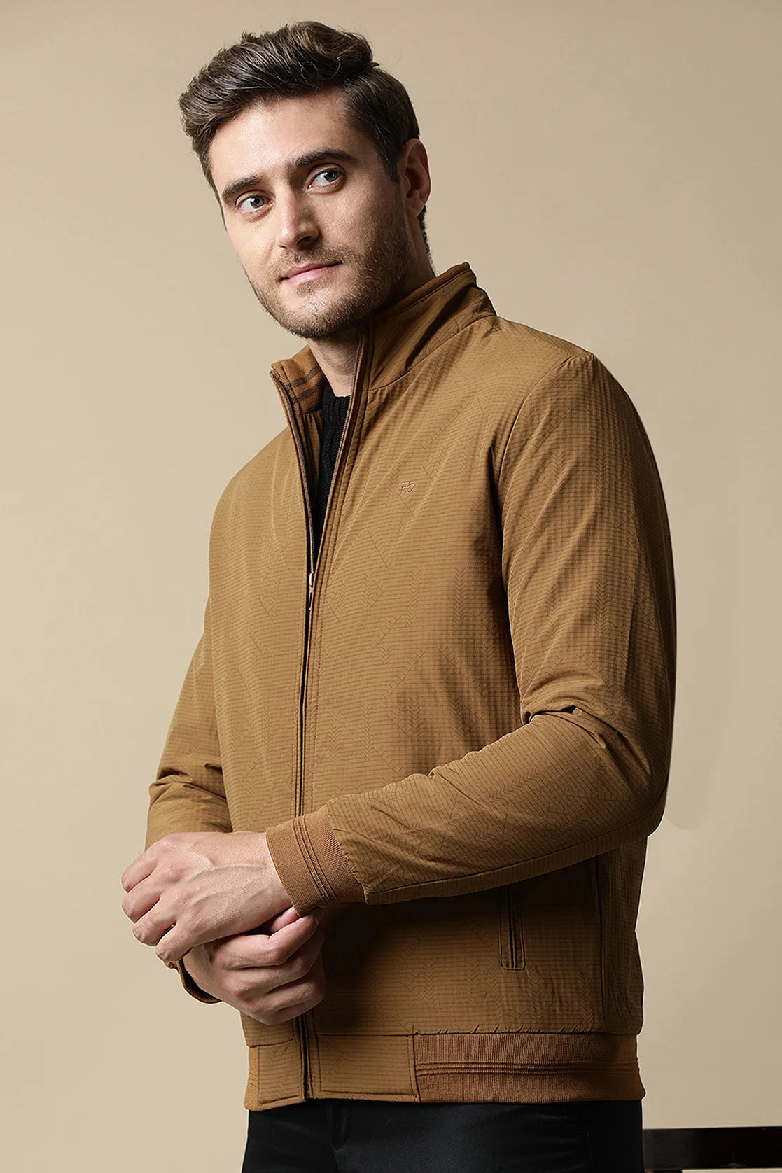 Upgrade your wardrobe with a trendy Men's Tan Textured Lightweight Jacket from Fort Collins. Shop now with ease, anywhere in India.