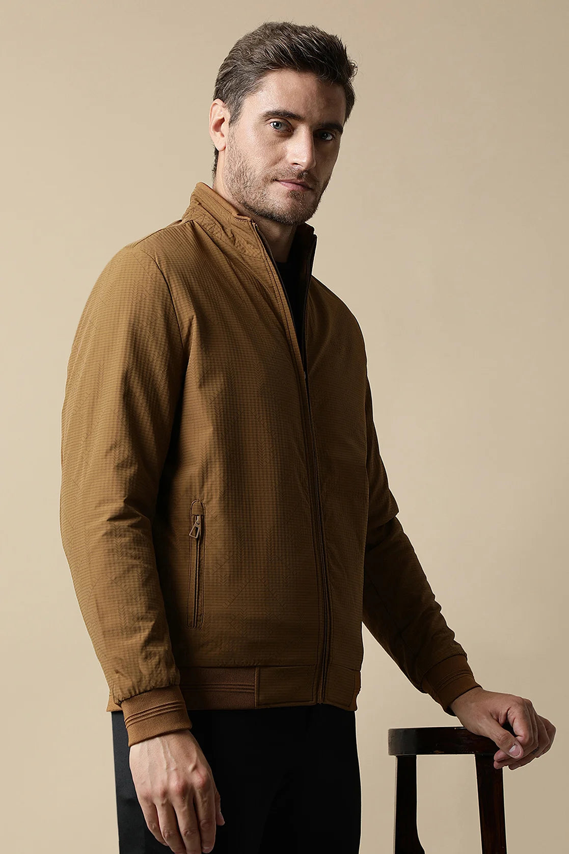 Upgrade your wardrobe in India with the Fort Collins Men's Tan Textured Lightweight Jacket, available for purchase online. Elevate your style with this trendy and versatile jacket.