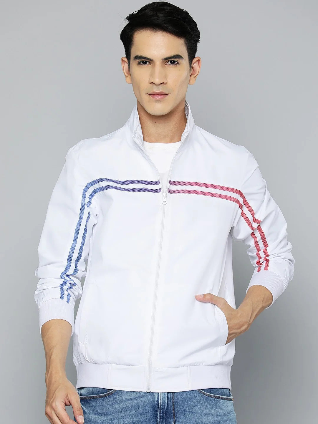 Discover the modern, stylish upgrade to your wardrobe with our Men's White Lightweight Track Jacket featuring dual-colored side stripes. Shop now for this must-have item from anywhere in India.