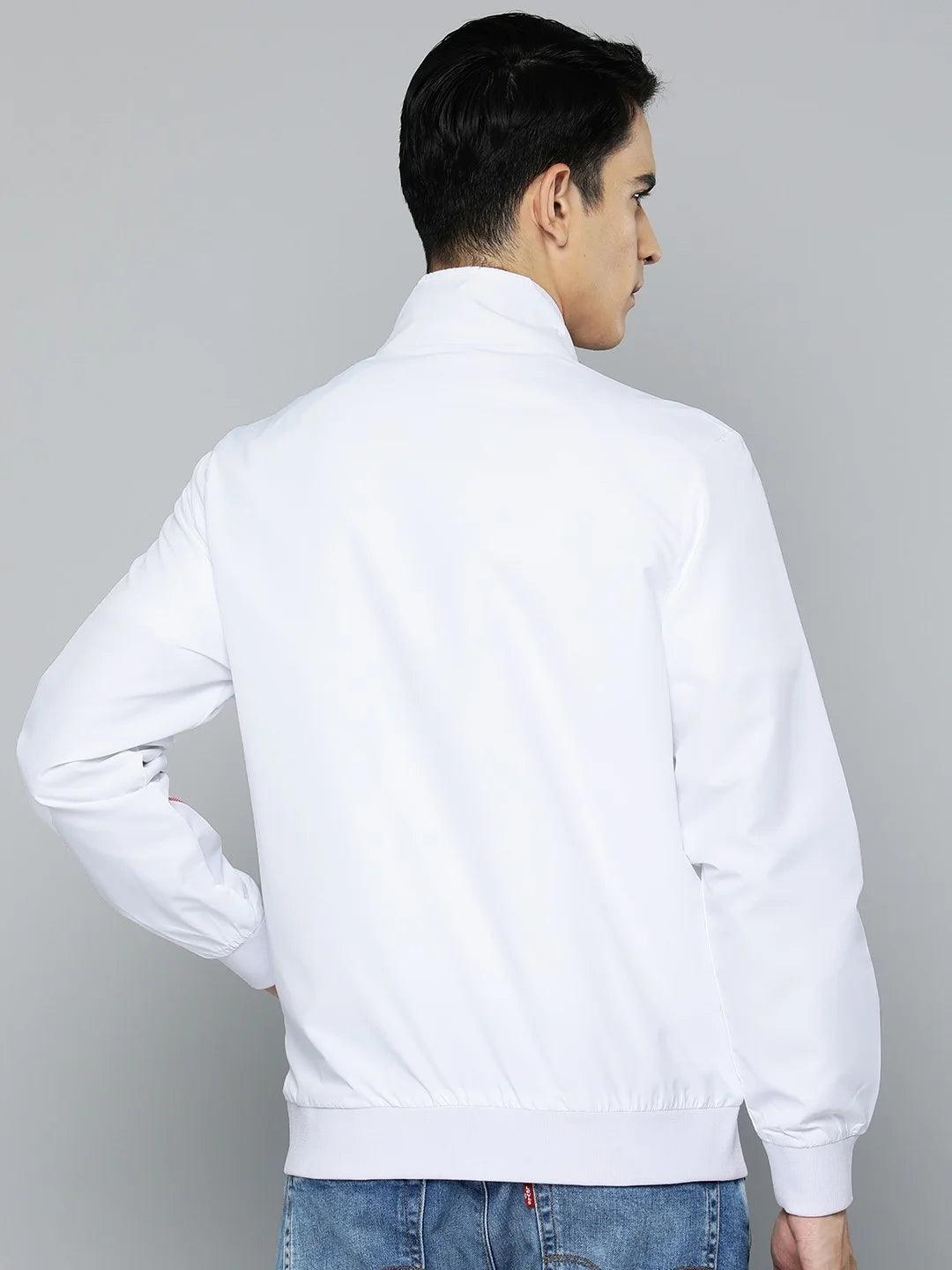 Discover the latest trend in men's fashion with this white lightweight track jacket featuring dual-colored side stripes. Available for purchase online and shipped anywhere in India.