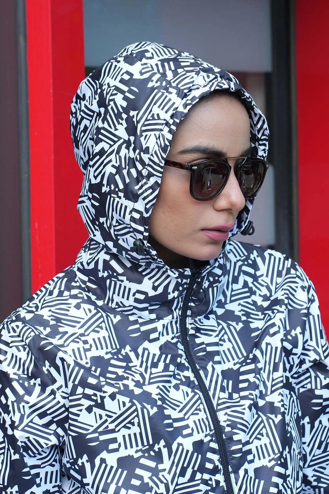 Discover Fort Collins' Women's White Abstract Printed Windbreaker, now available online in India.