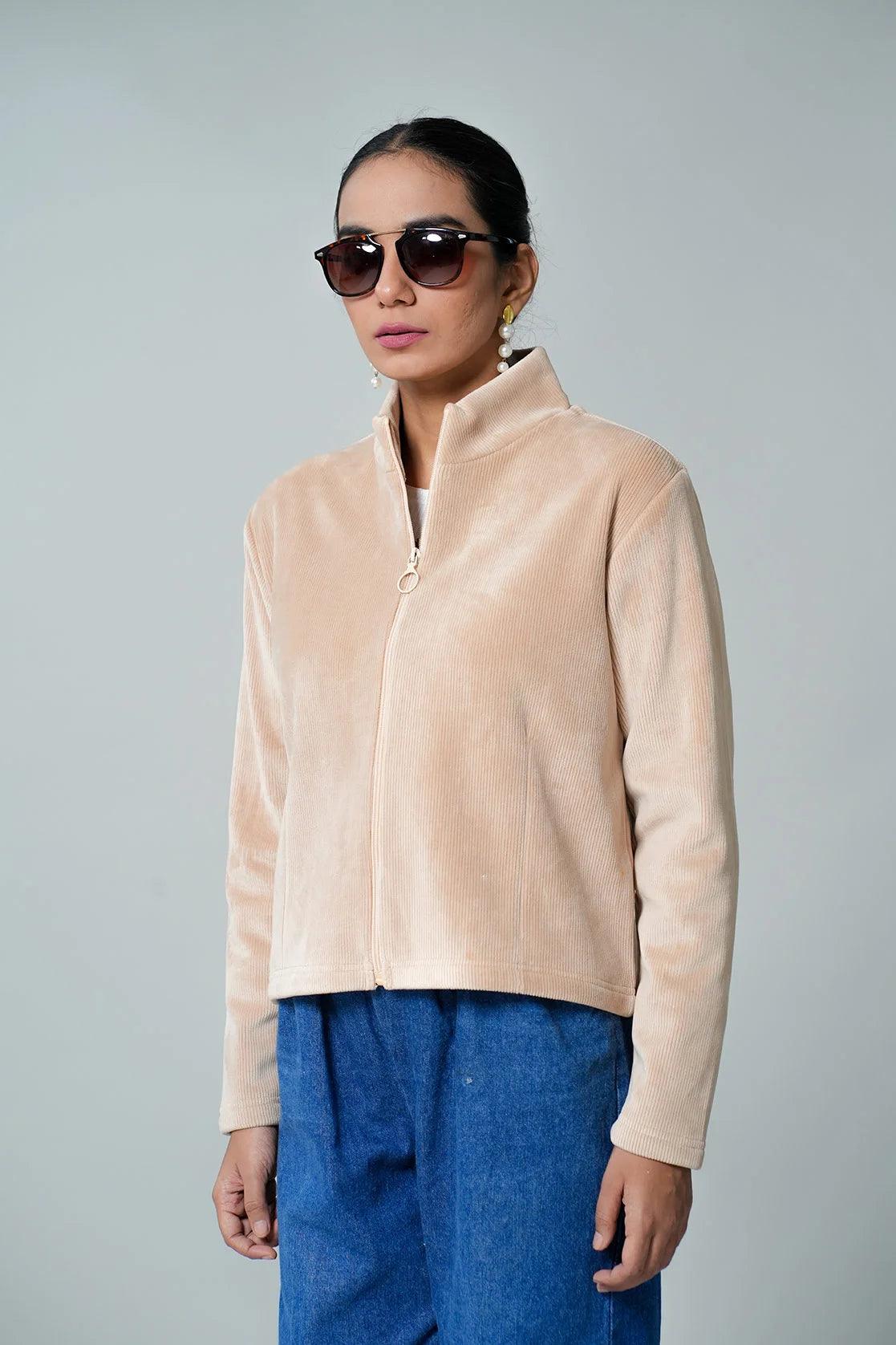 Elevate your wardrobe with our Women's Beige Corduroy Jacket, available now online from Fort Collins. Embrace the stylish stand collar and shop from anywhere in India for a sophisticated upgrade.